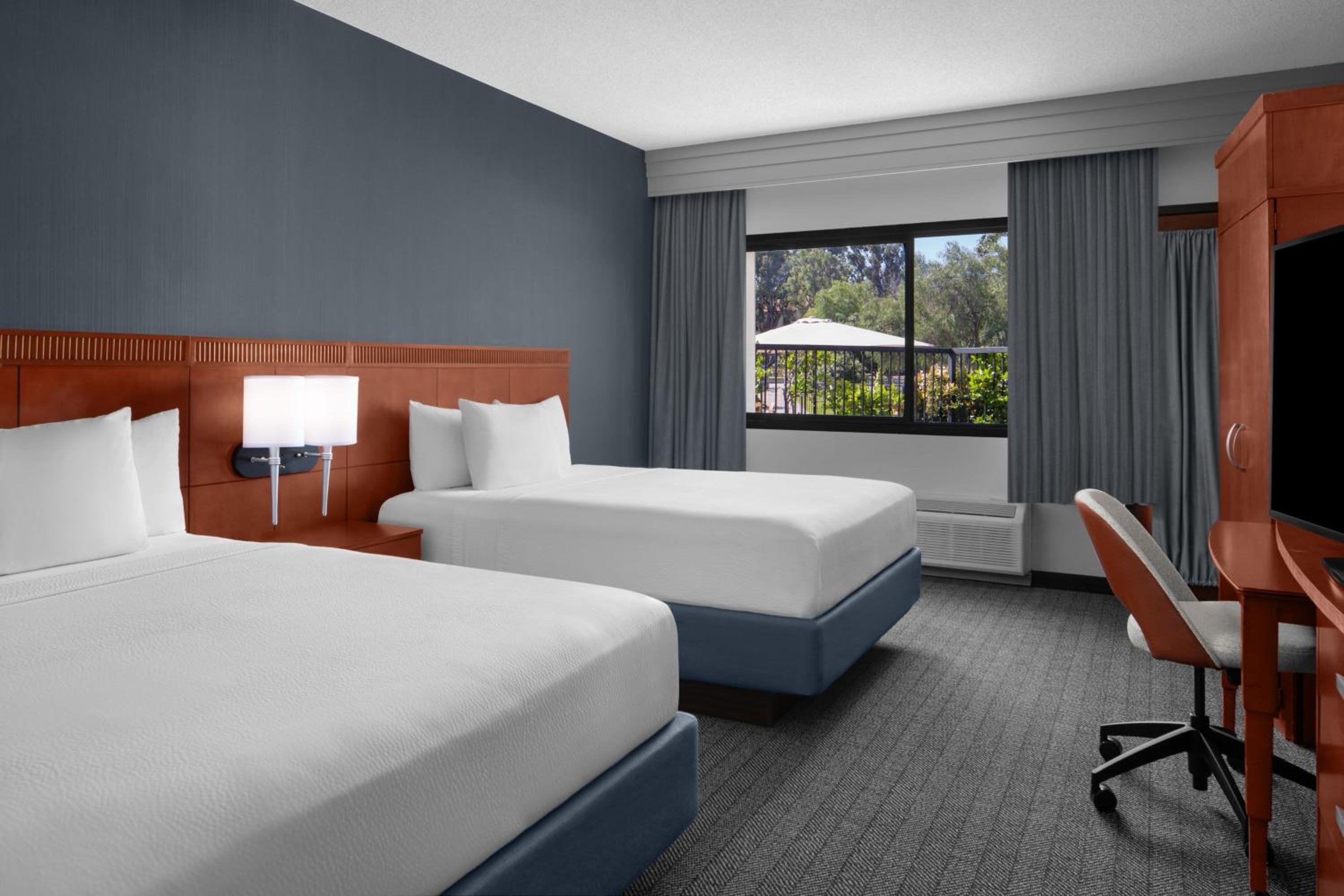 Queen Room with Two Queen Beds and Private Patio - Photo 1