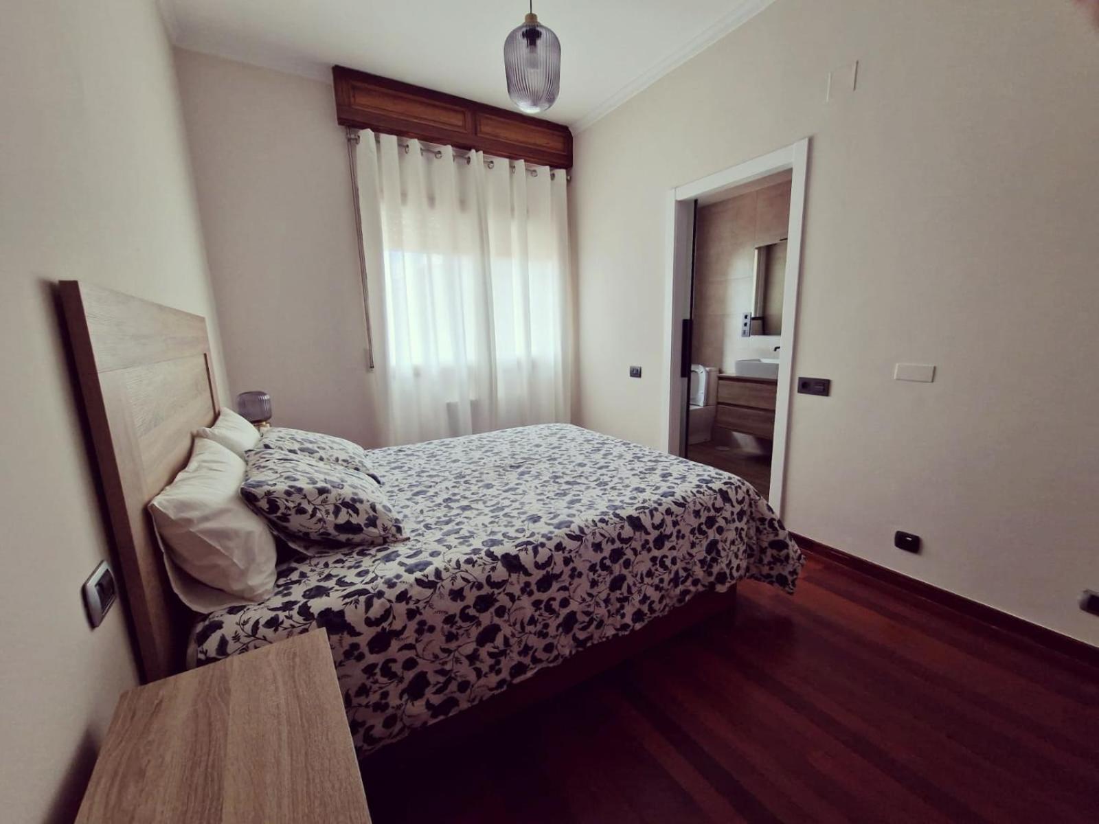 Three-Bedroom Apartment photo 2