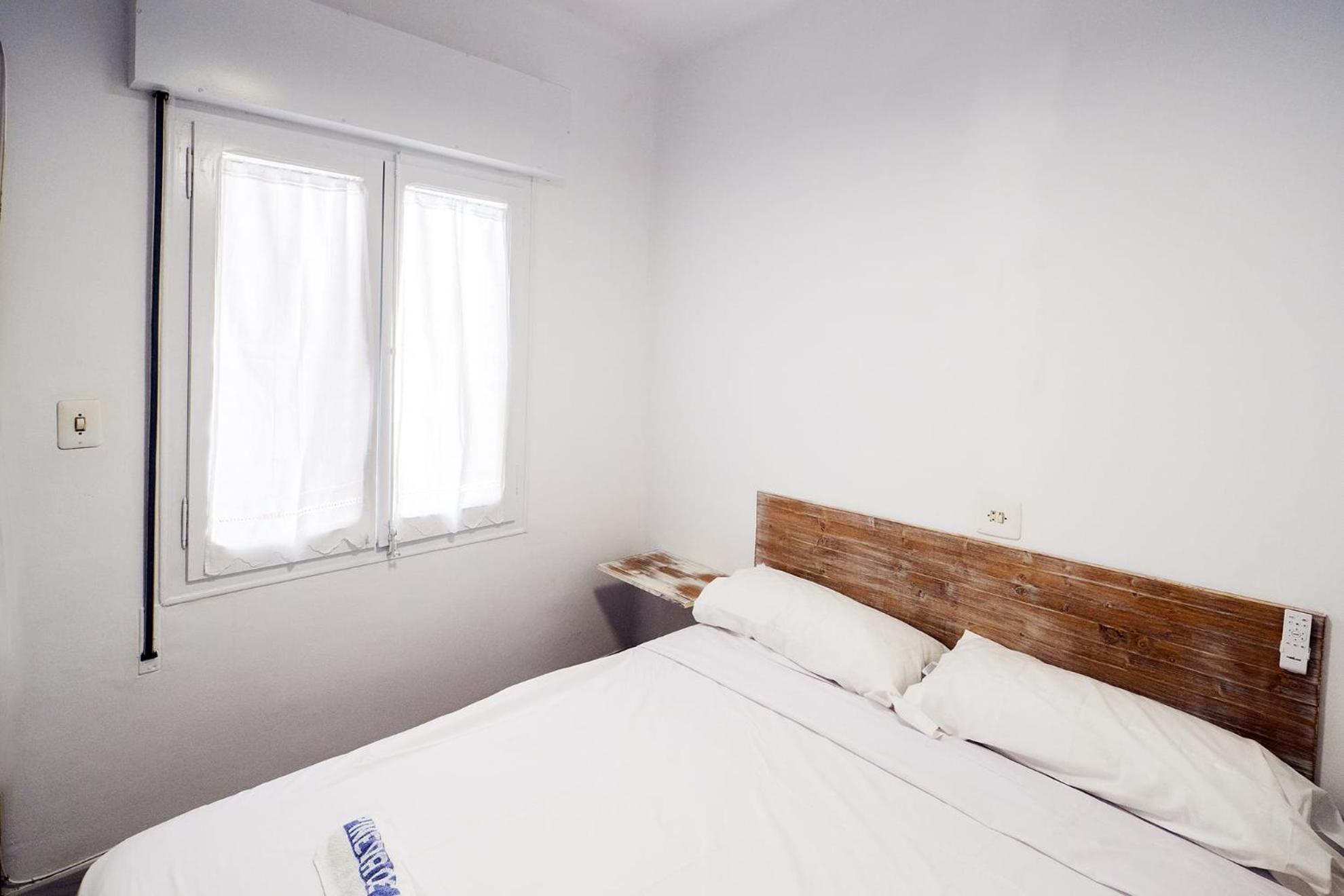 Habitación Queen con Baño Compartido