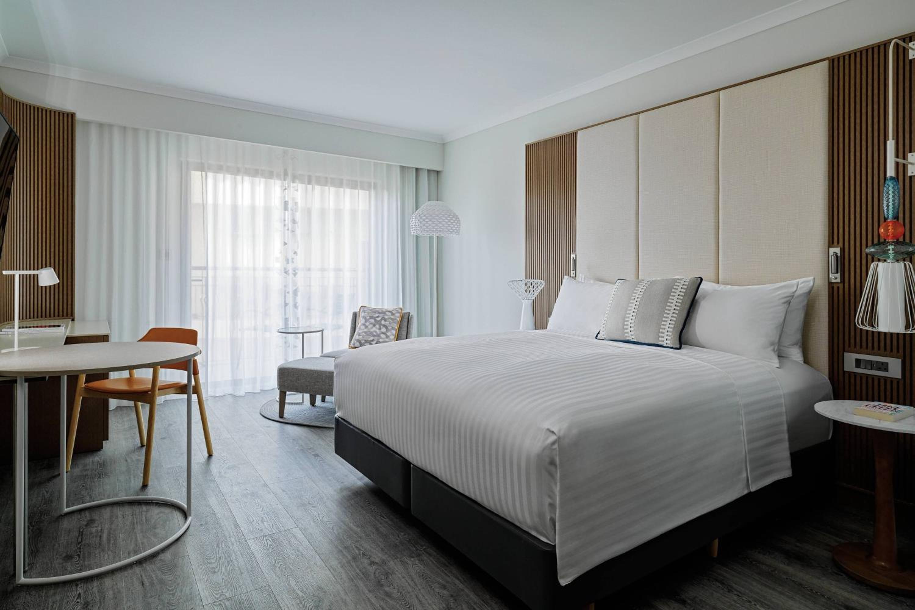 Superior Room 1 King Bed, Courtyard View with Balcony