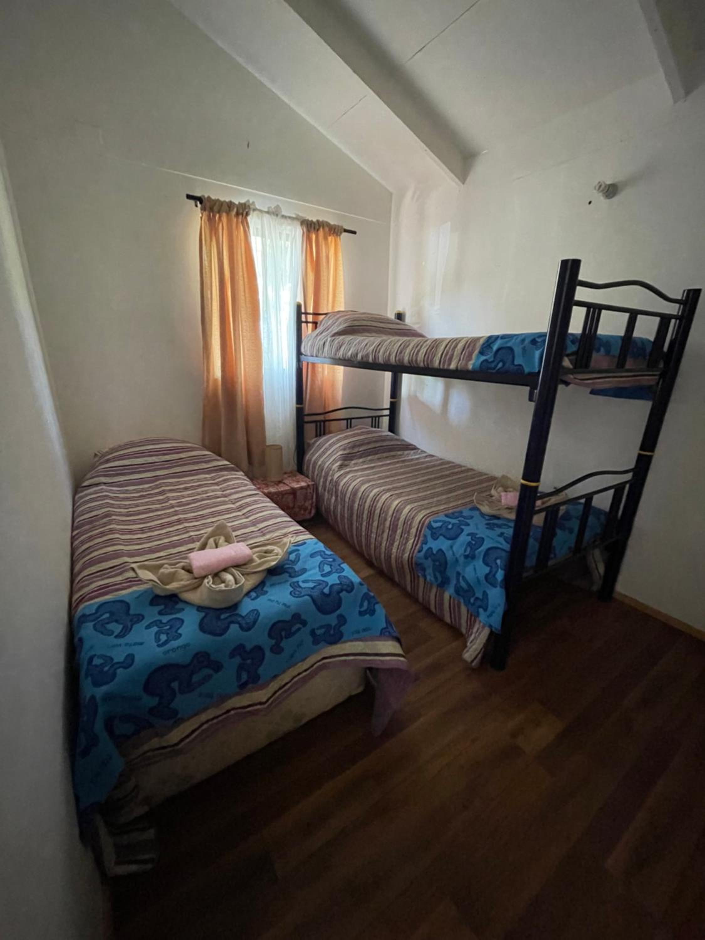 Basic Triple Room with Shared Bathroom photo 1