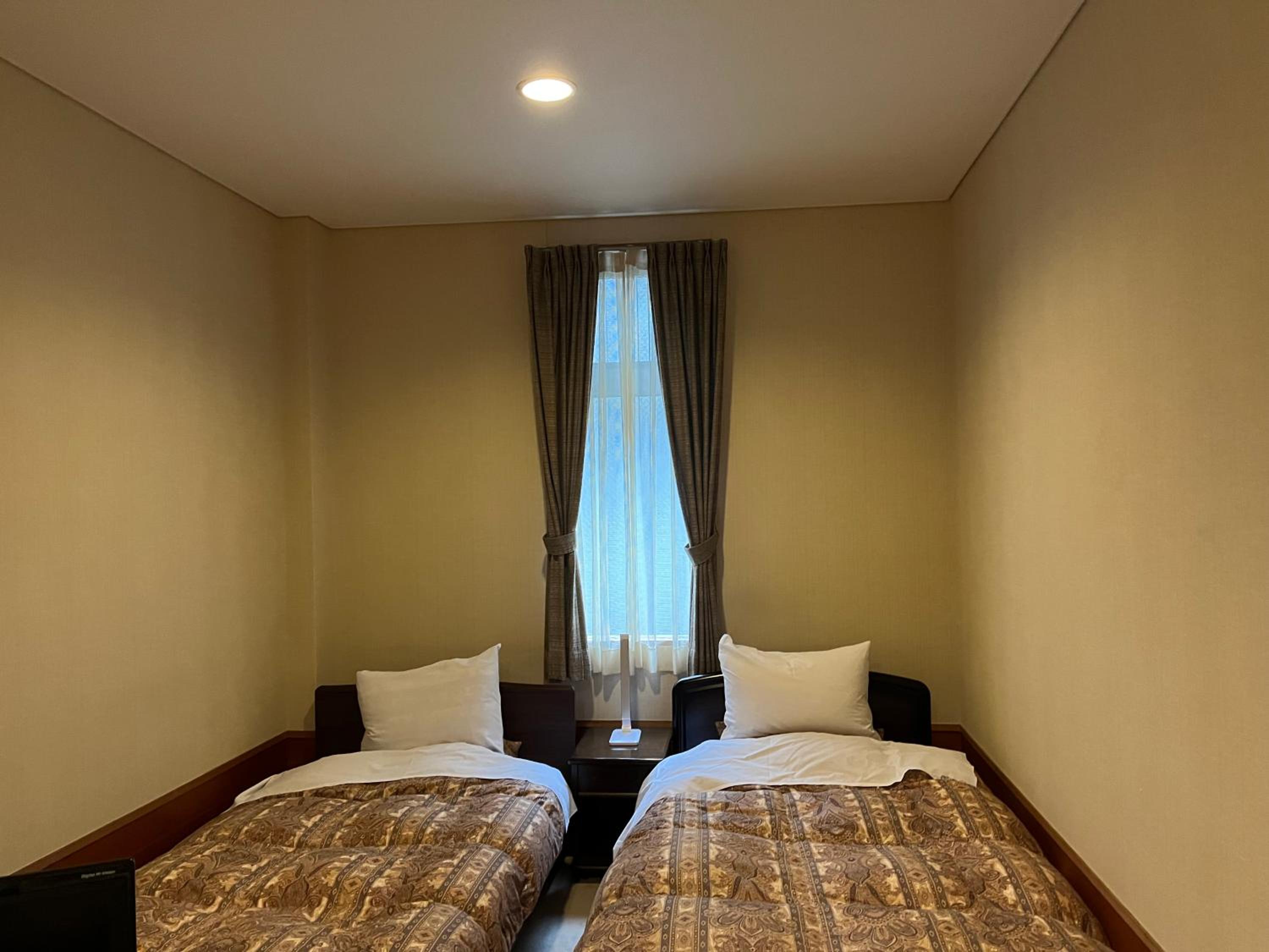 Standard Twin Room with Sofa photo 3