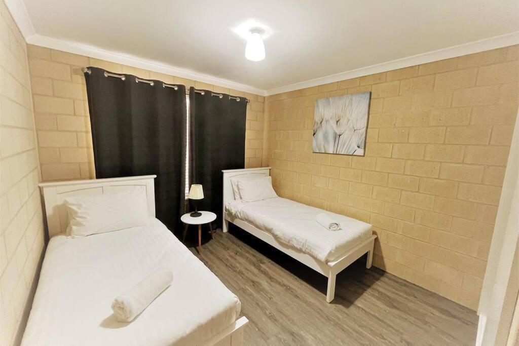 Three-Bedroom Apartment photo 1