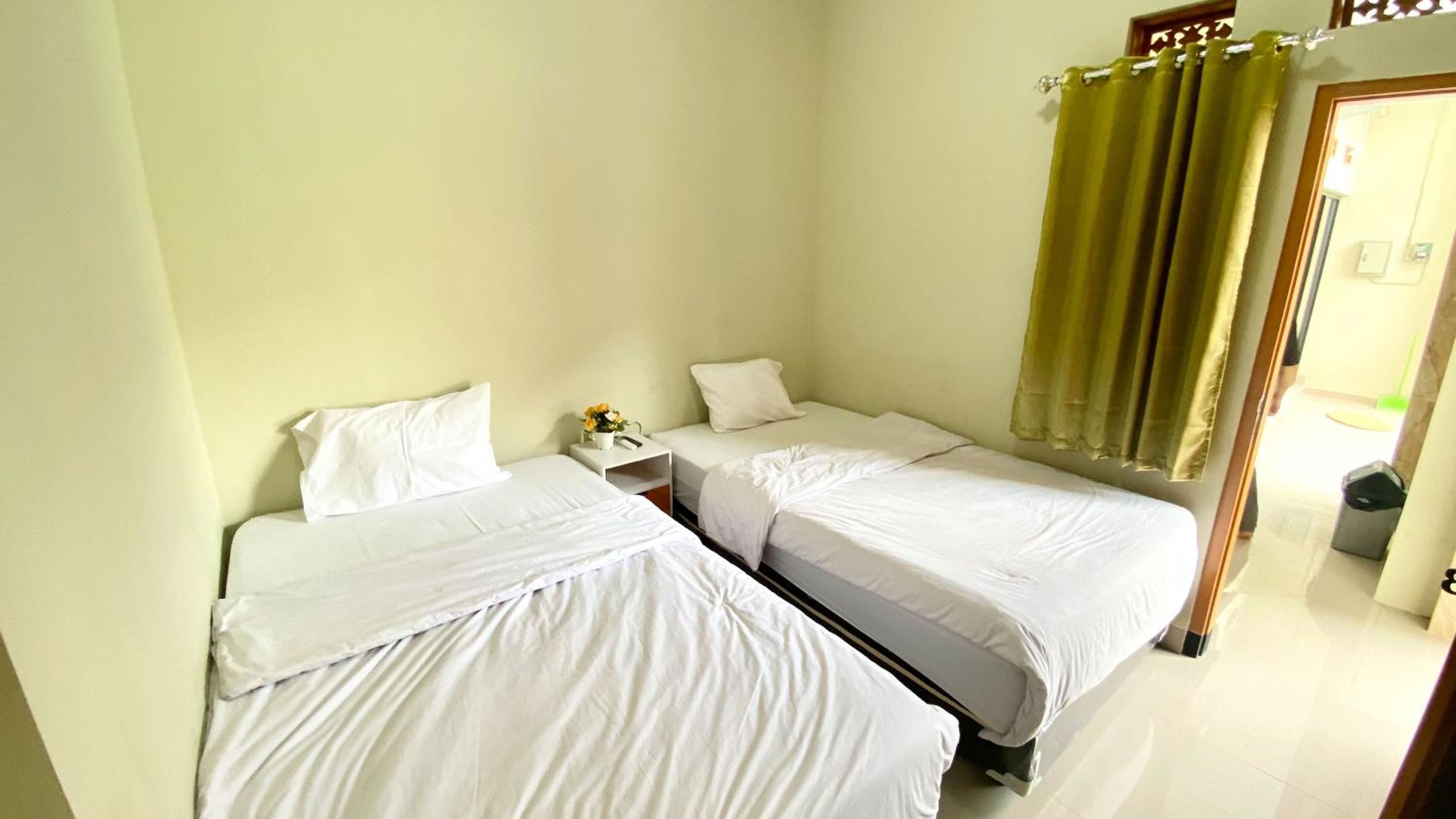 Twin Room - Photo 1
