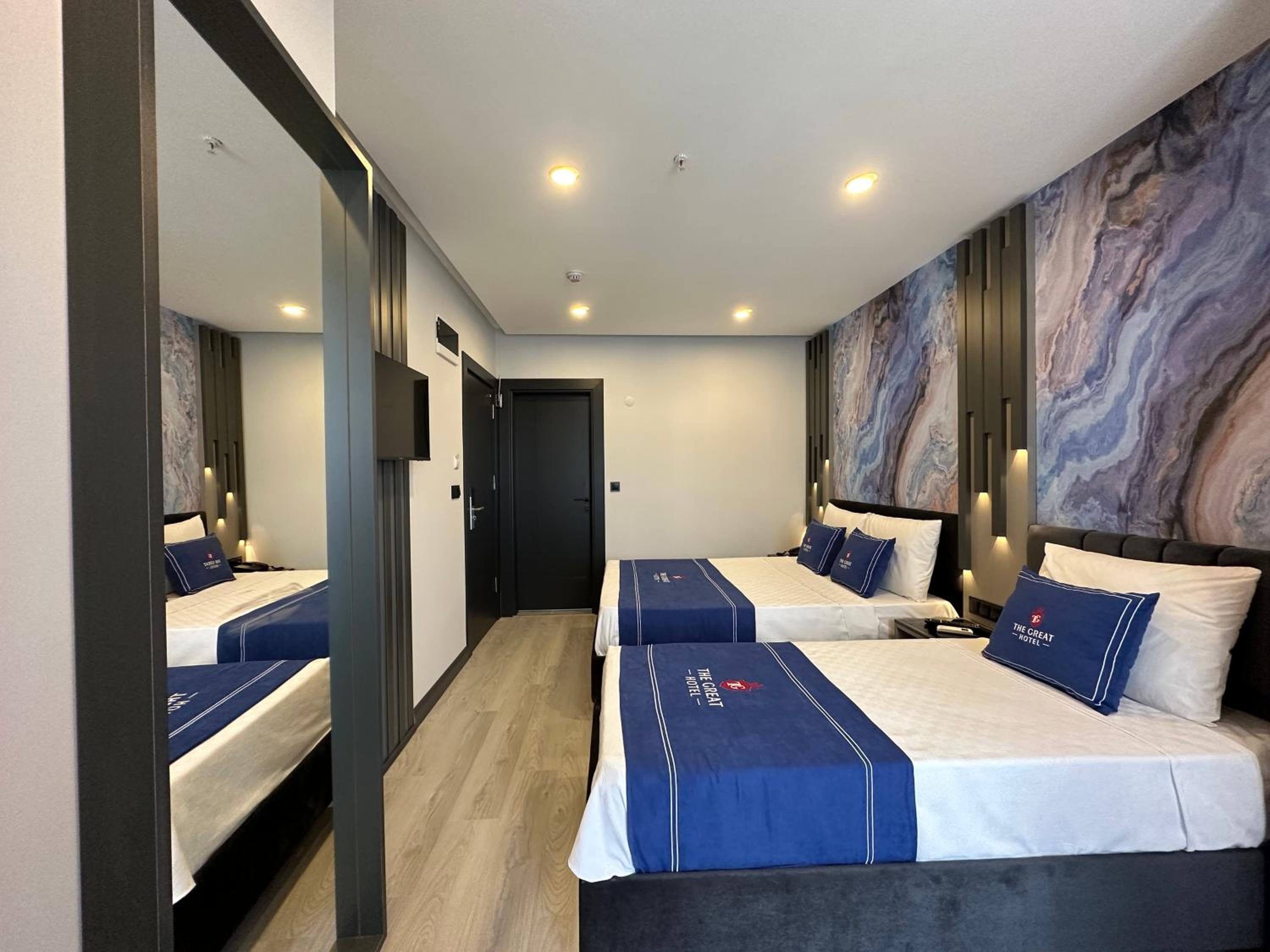 Deluxe Triple Room - Photo 2