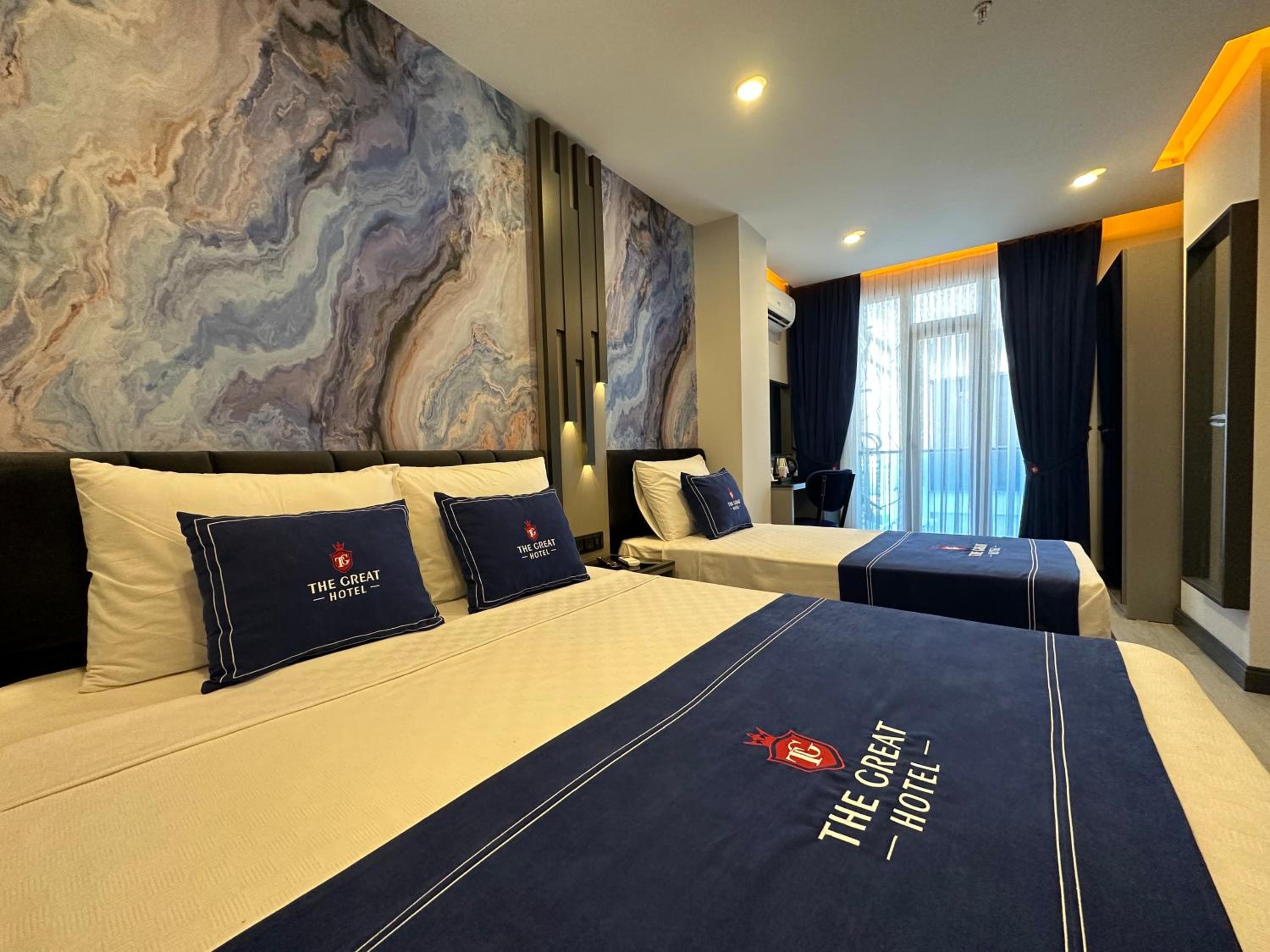 Deluxe Triple Room - Photo 12