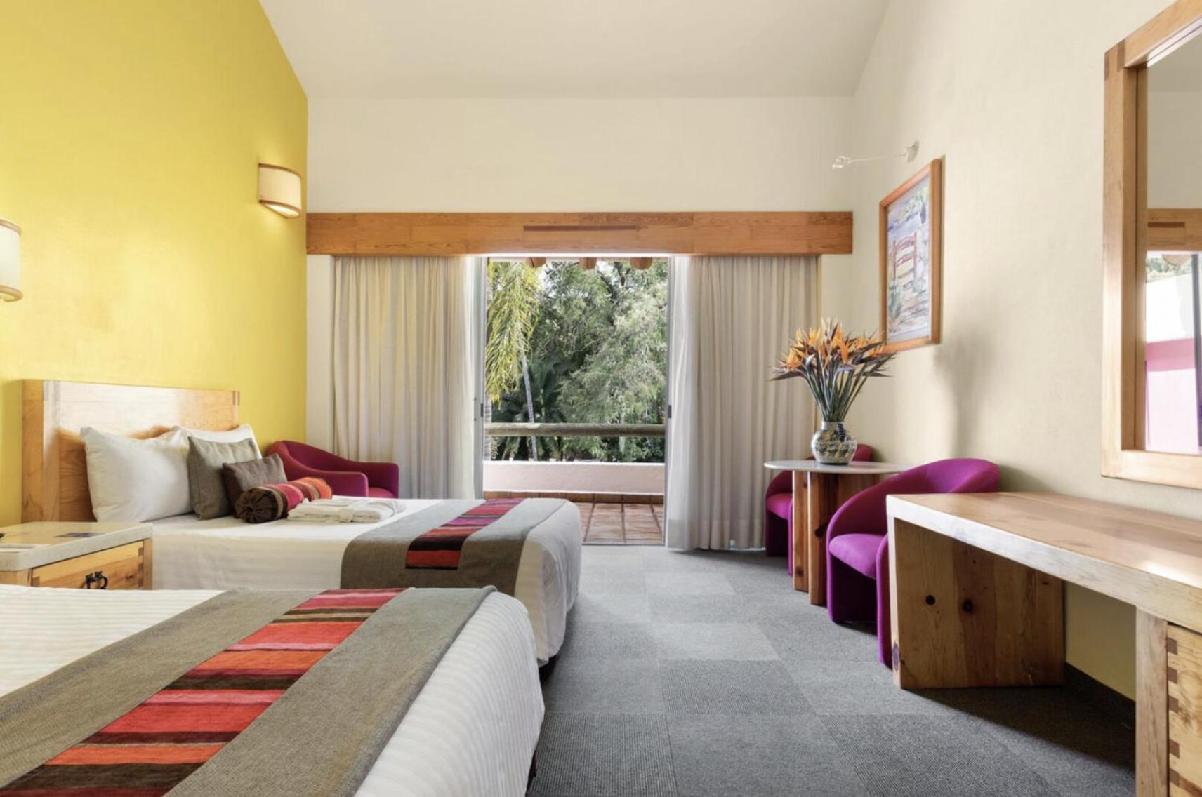 Standard Queen Room with Two Queen Beds - Photo 1