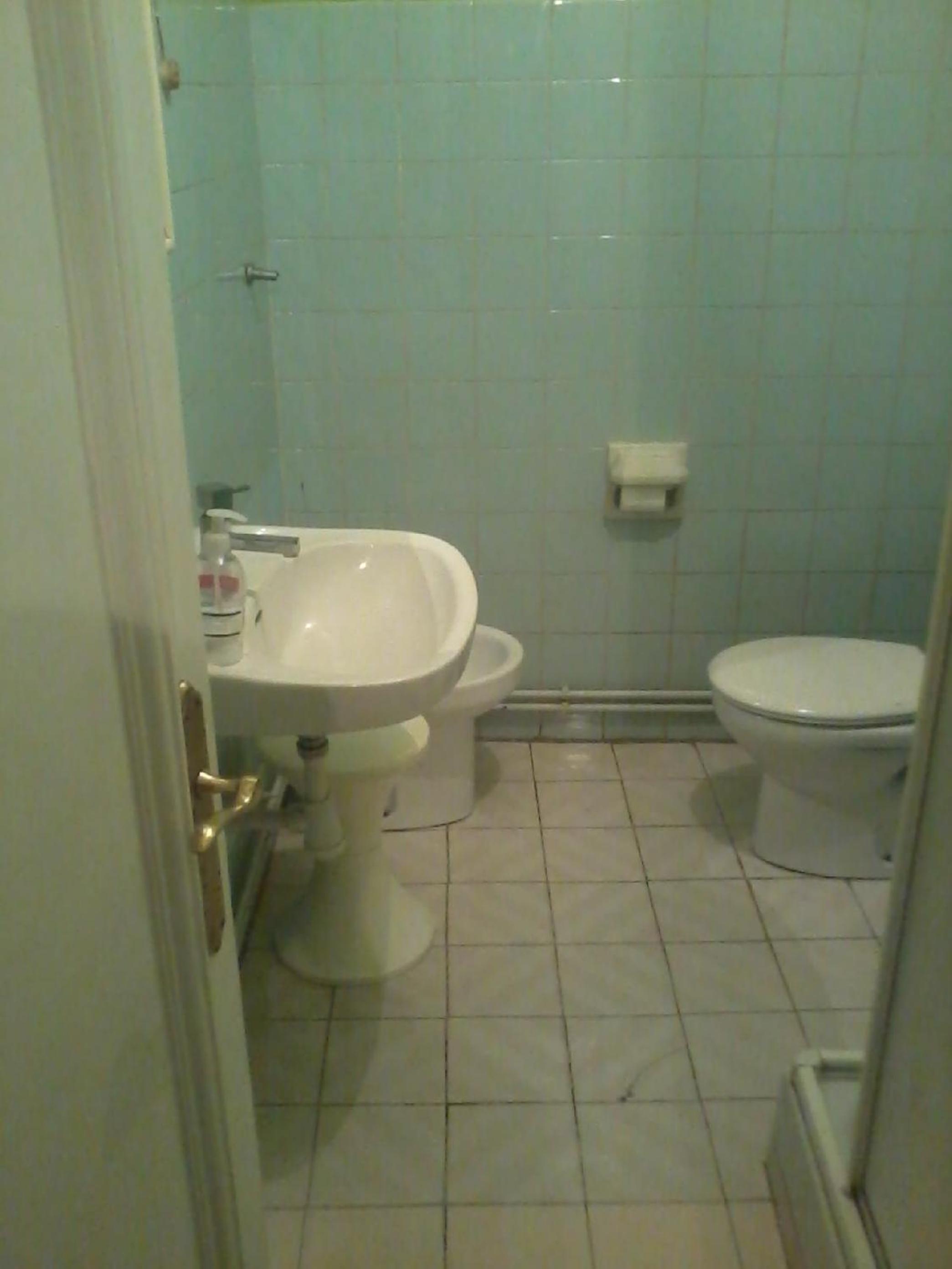 Basic Triple Room with Shared Bathroom photo 3