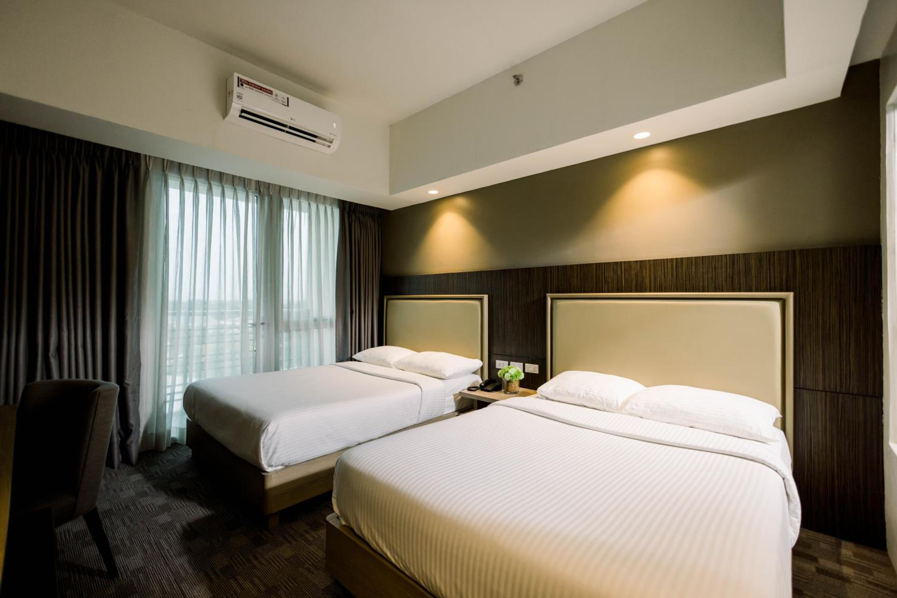 Deluxe Room with Balcony - Photo 1