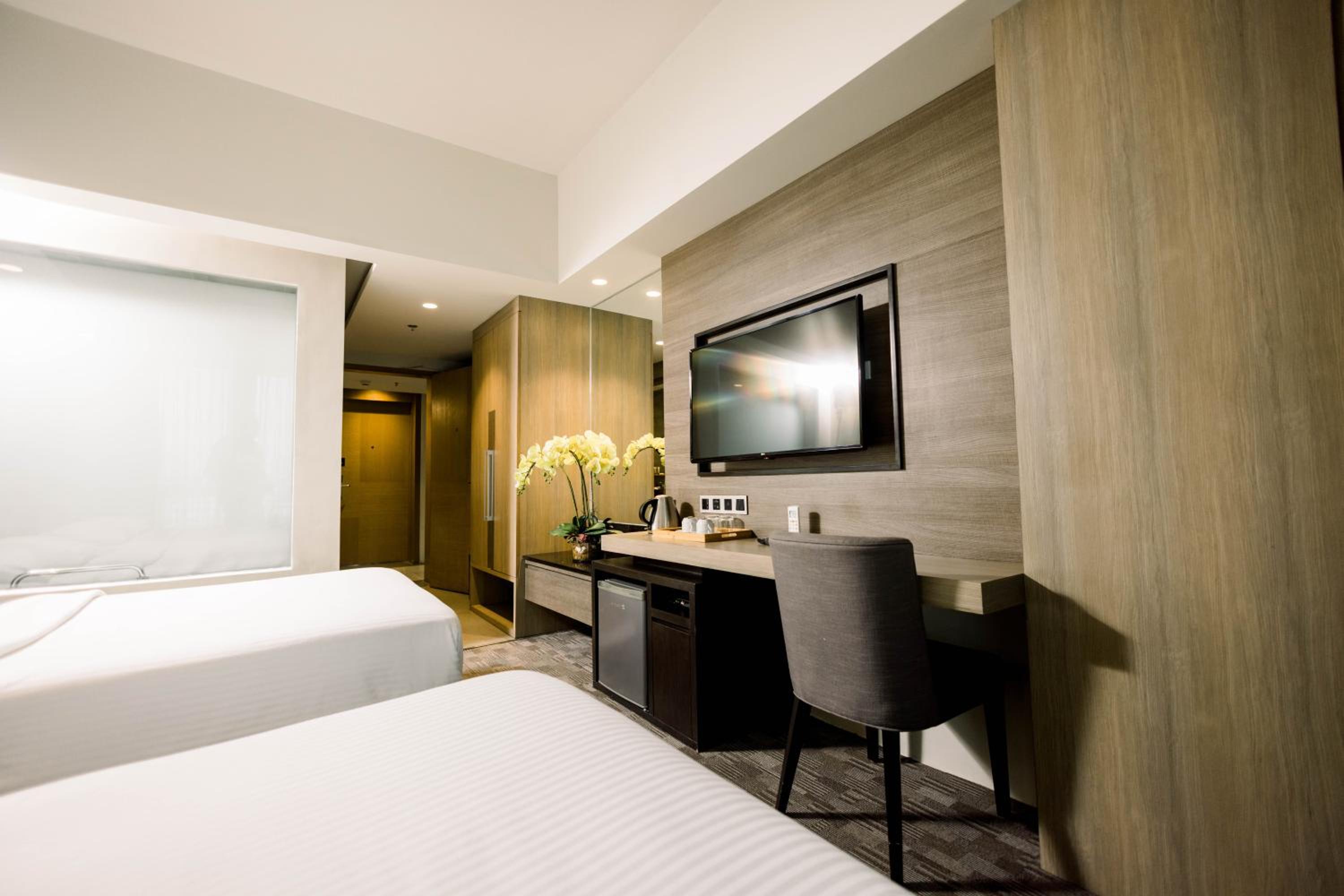 Deluxe Room with Balcony - Photo 2