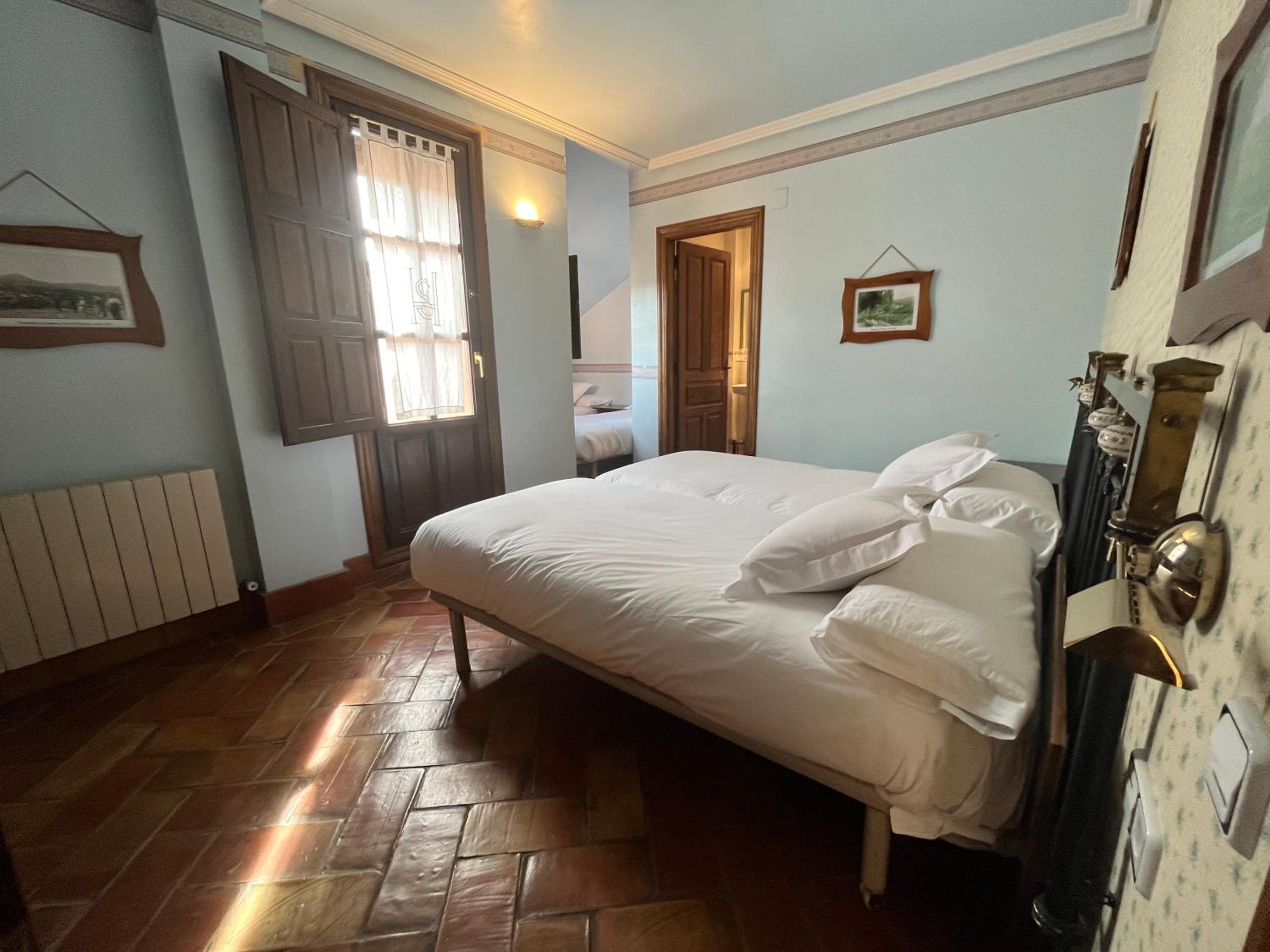 Habitación Familiar con Terraza (2 Adultos + 2 Niños)