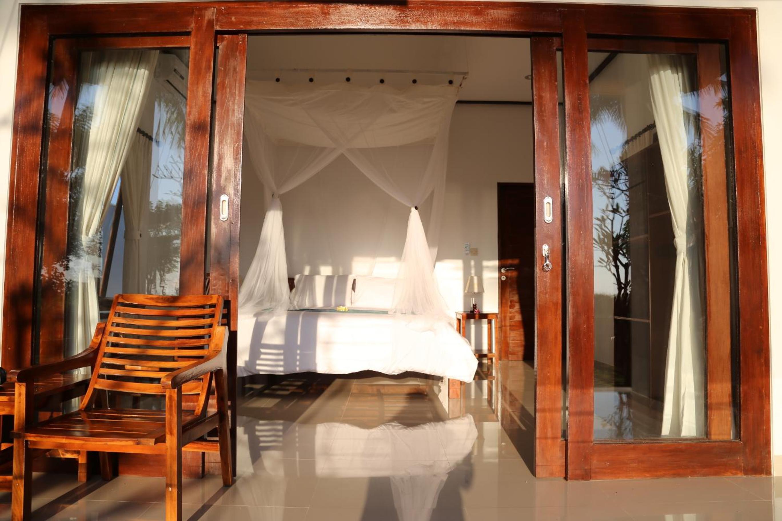 Deluxe Double Room with balcony and Garden View photo 1