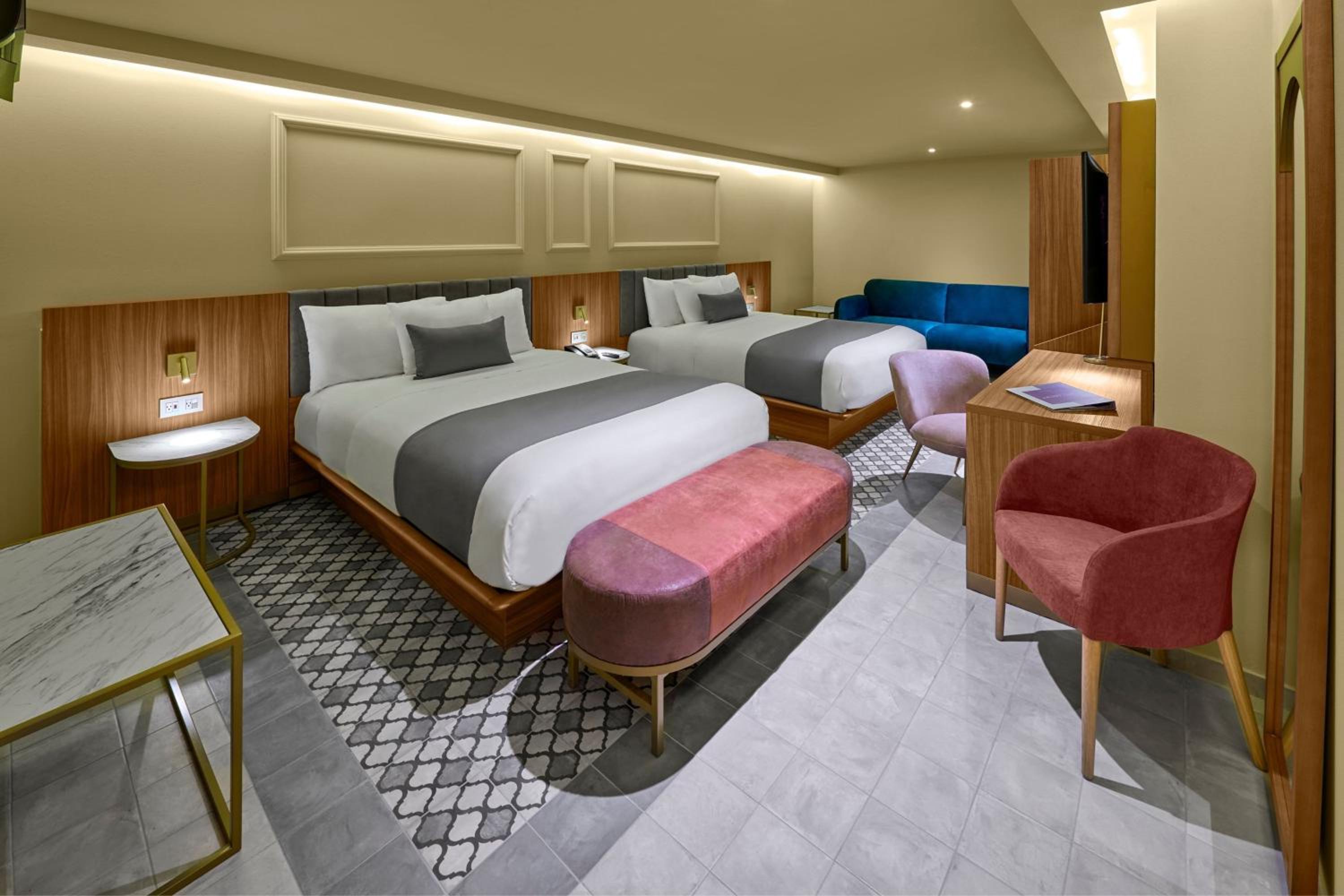 Superior Queen Room with Two Queen Beds and Sofa Bed