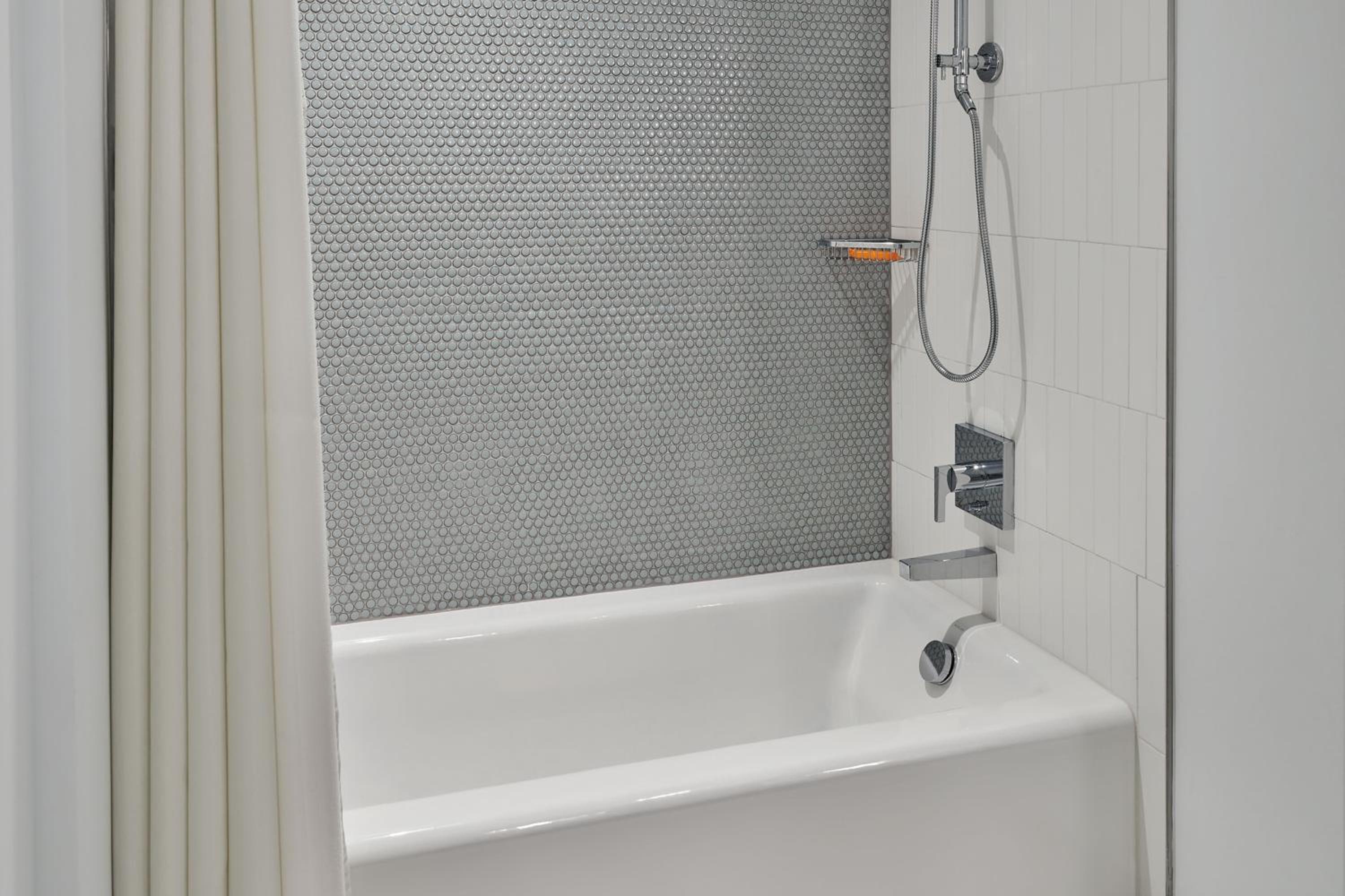 Traditional King Room with Sofa Bed and Adapted Tub - Mobility and Hearing Accessible (Includes Early Entry To Disney Theme Parks) thumbnail 6