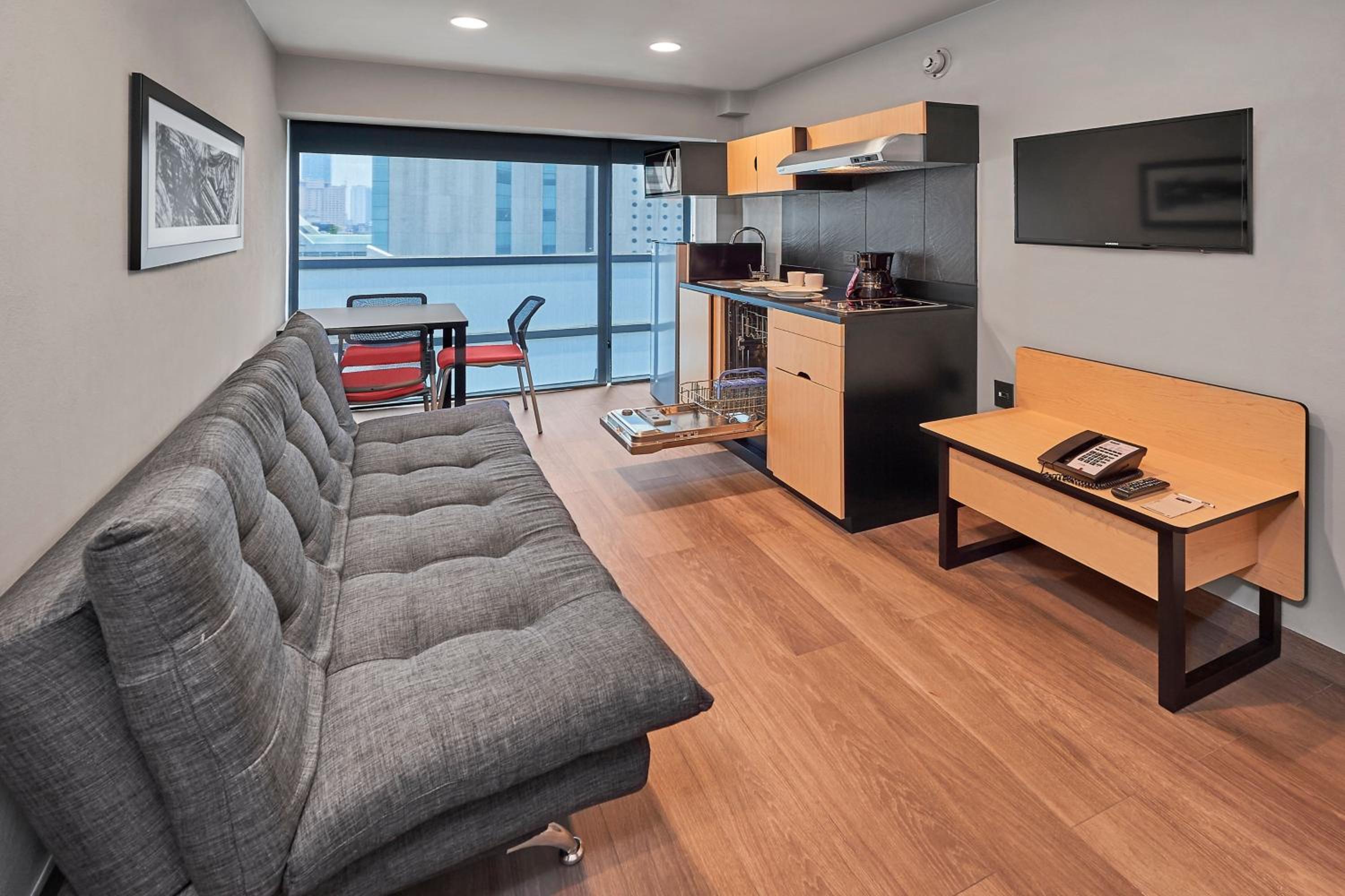 One-Bedroom Suite with Two Double Beds and Sofa Bed