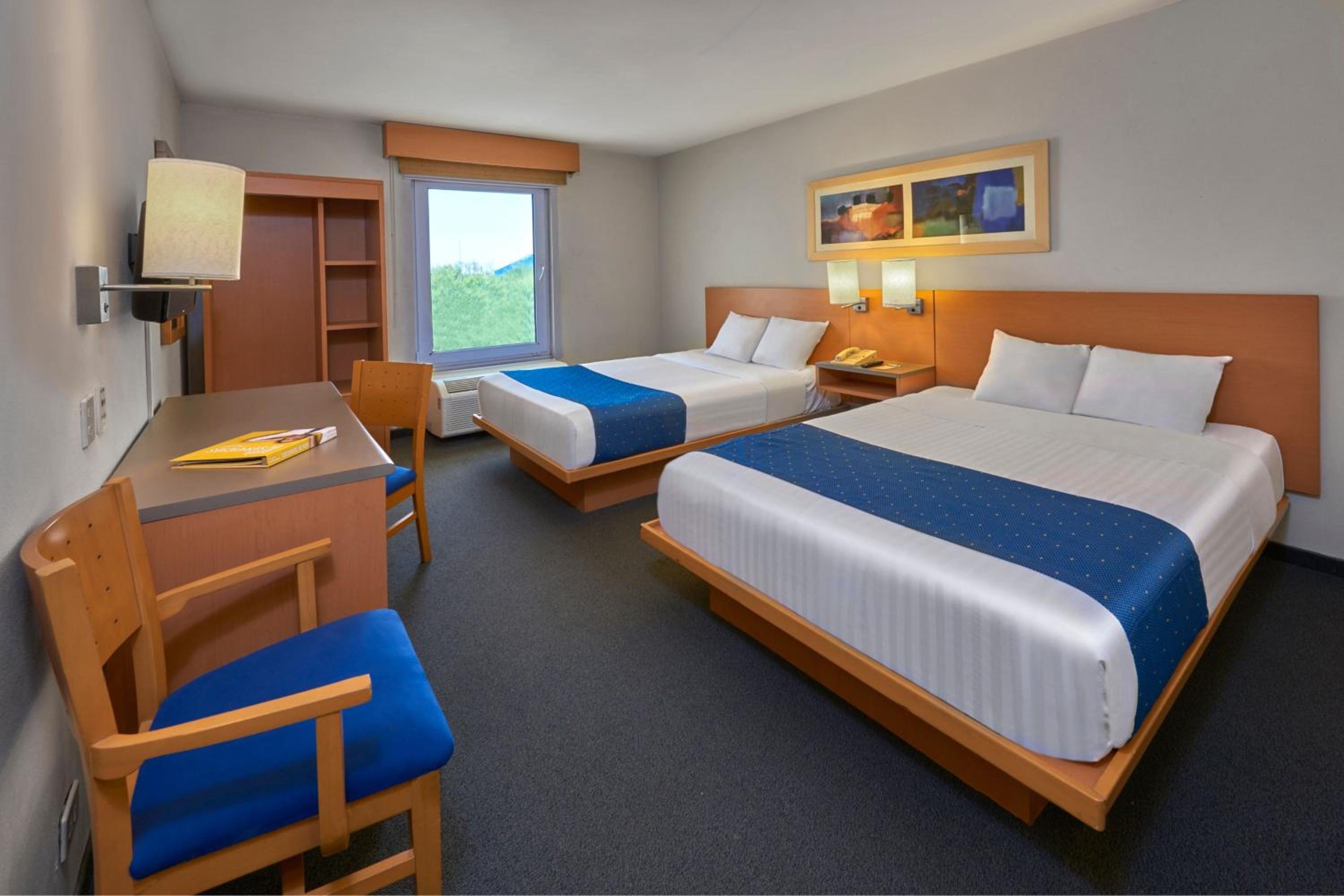 Queen Room with Two Queen Beds - Photo 1