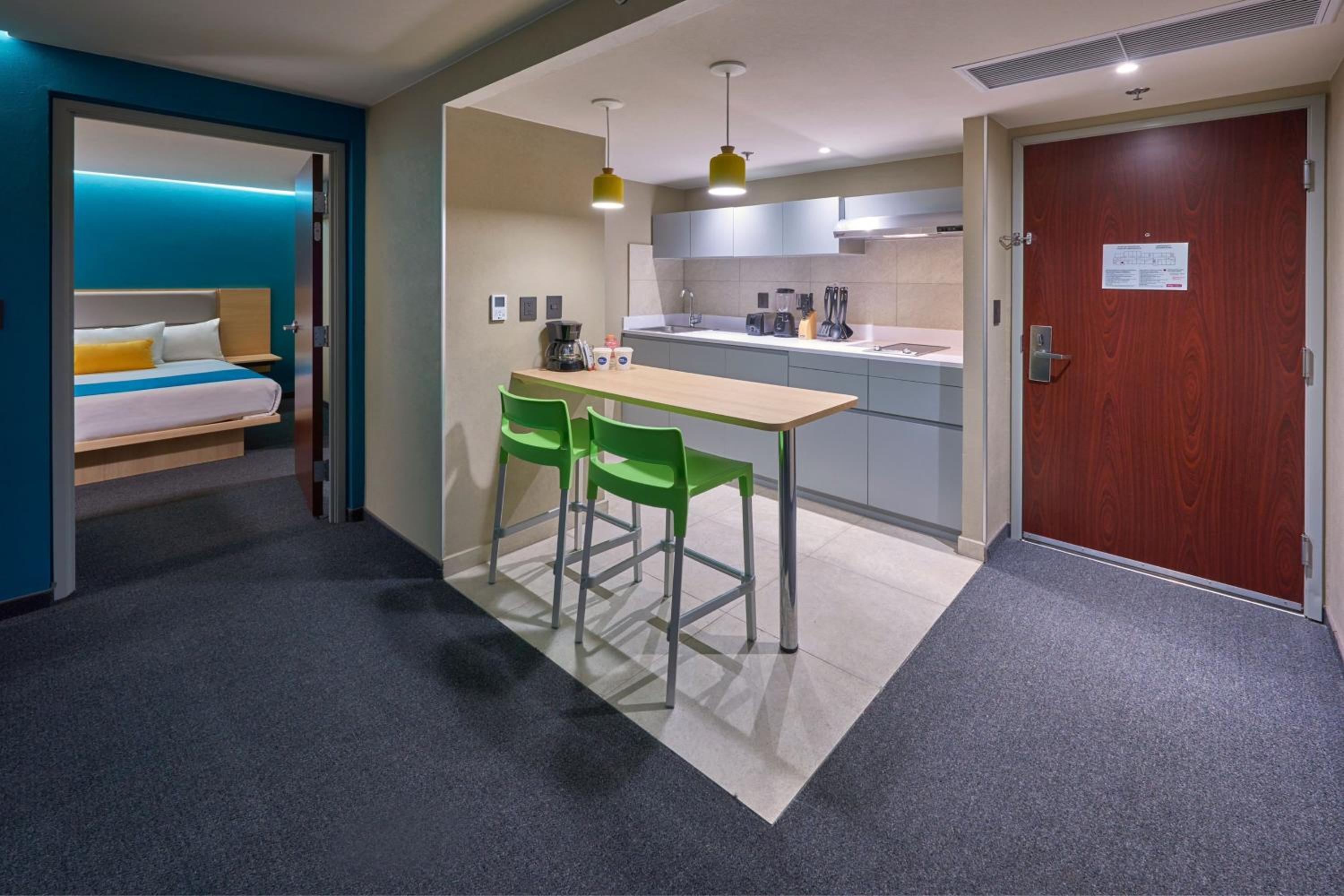 Two-Bedroom Suite With One King And Two Double Beds