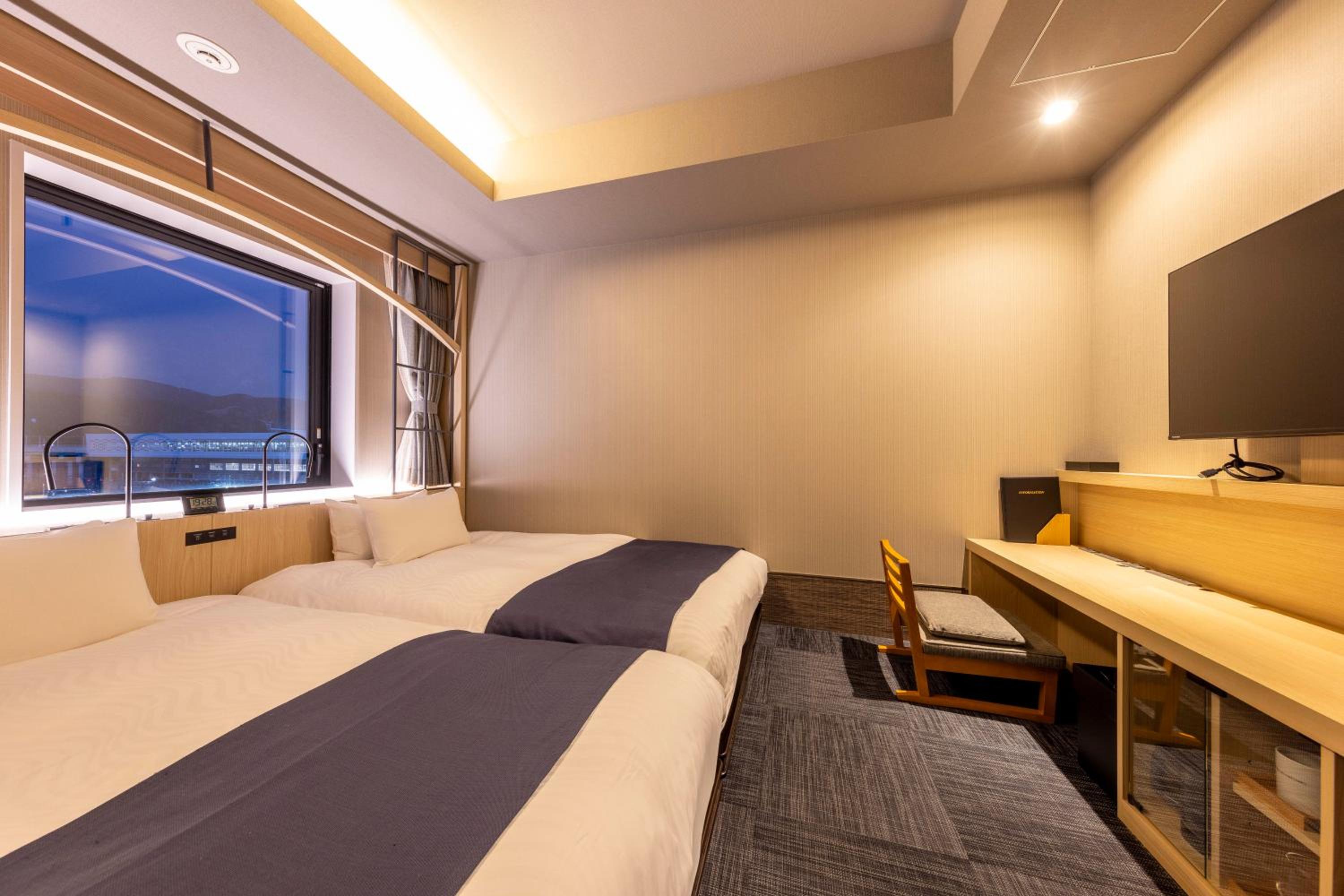 Twin Room - Photo 1