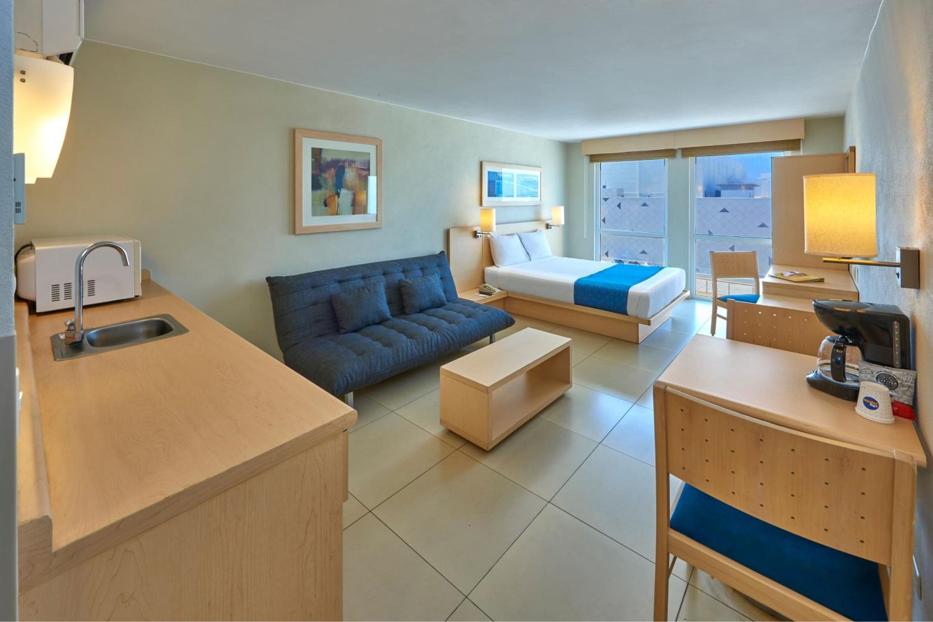 Queen Suite with Sofa Bed - Photo 1