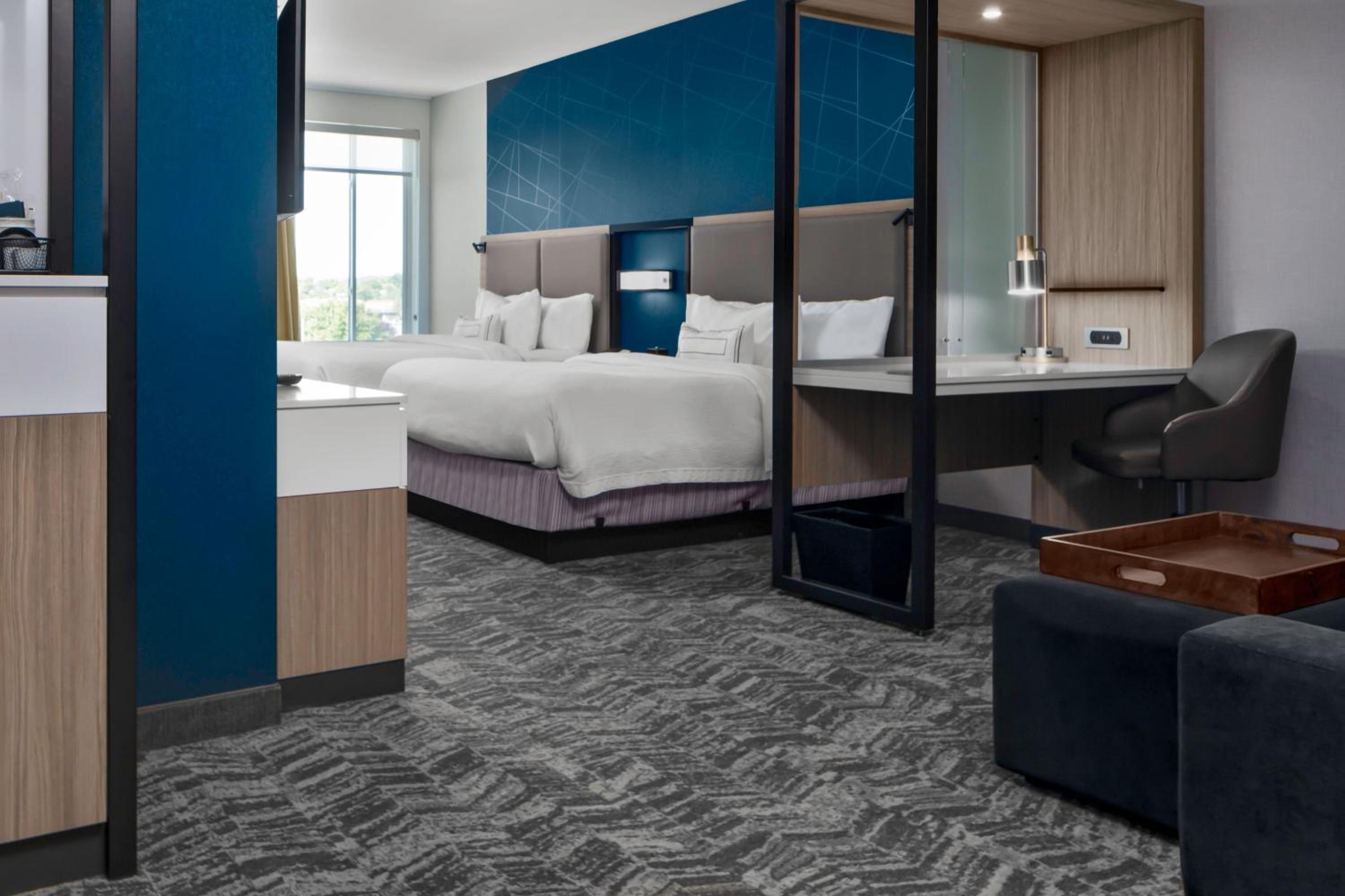 Queen Suite with Two Queen Beds and Trundle Sofa - Photo 1