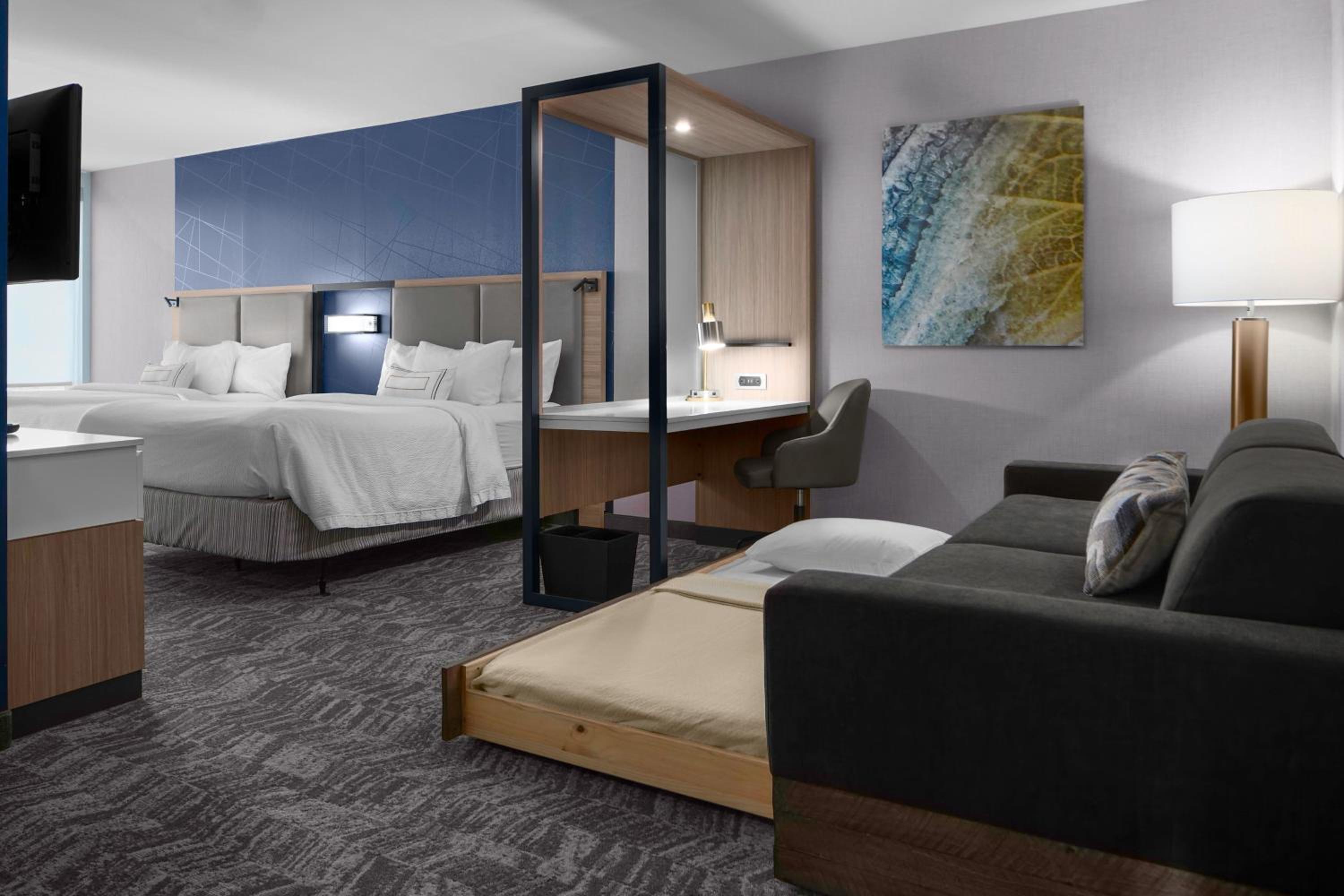 Queen Suite with Two Queen Beds and Trundle Sofa - Photo 2