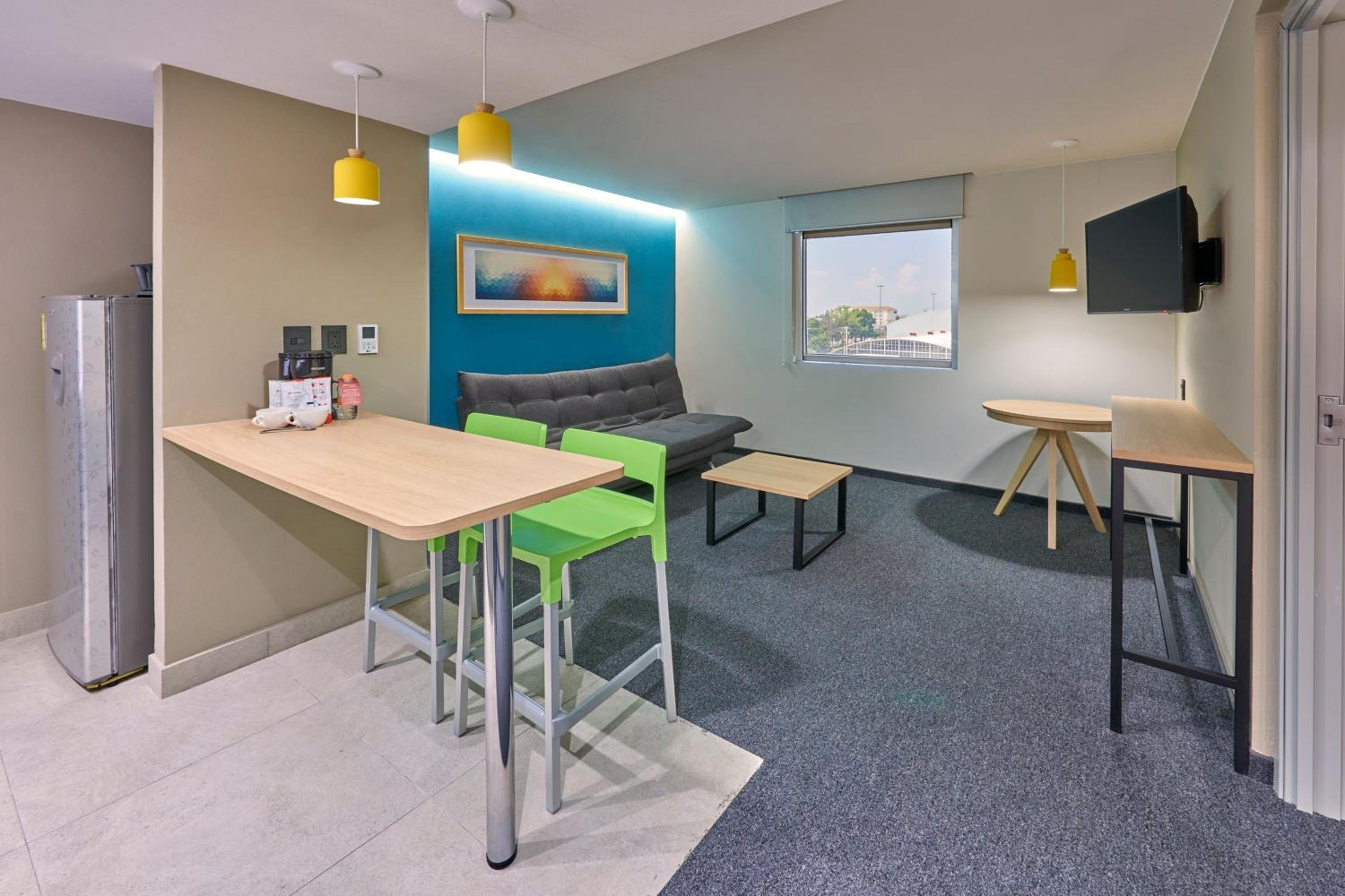 Two-Bedroom Suite With One King And Two Double Beds With Sofa Bed