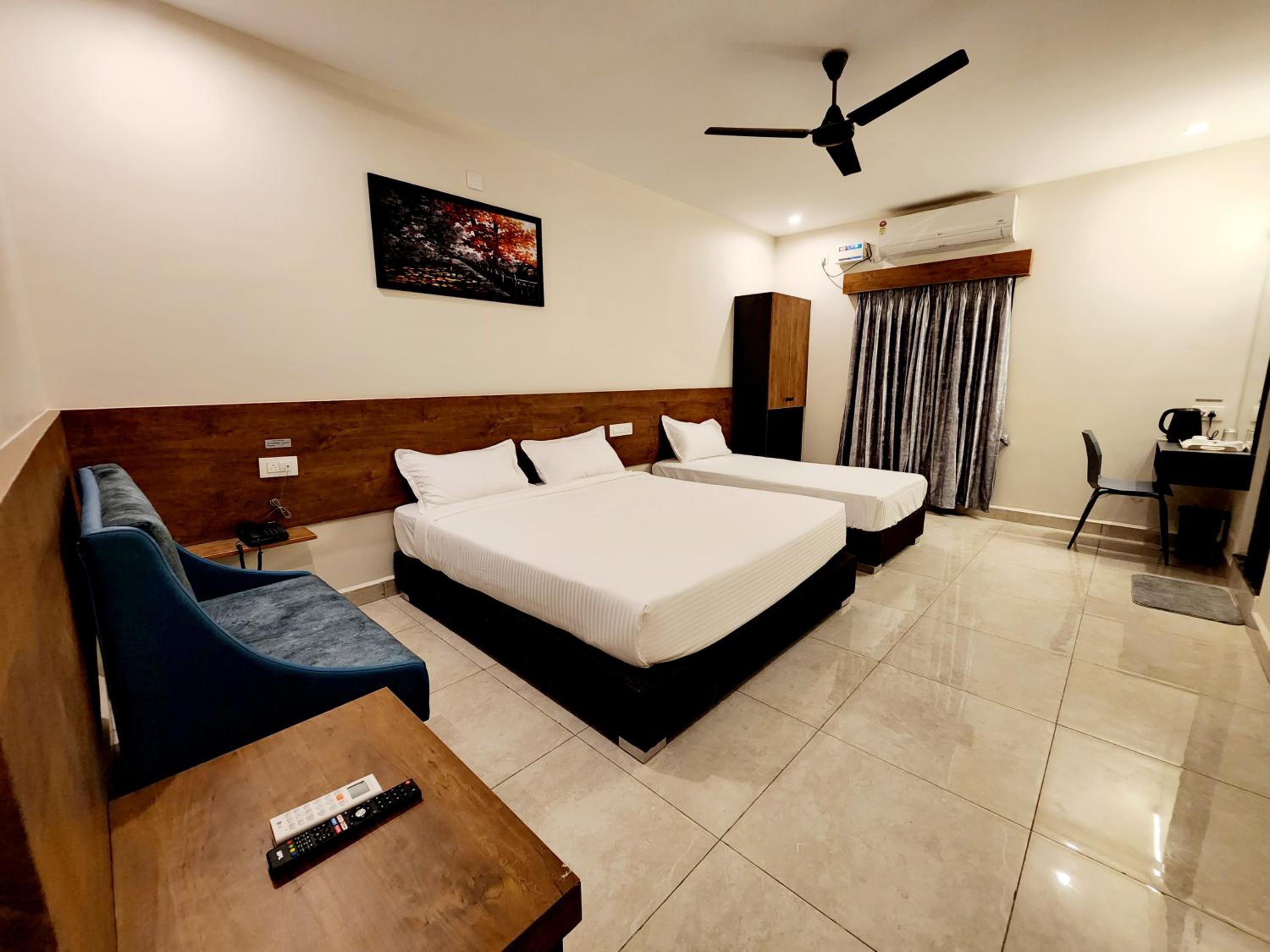 Deluxe Triple Room - Photo 1