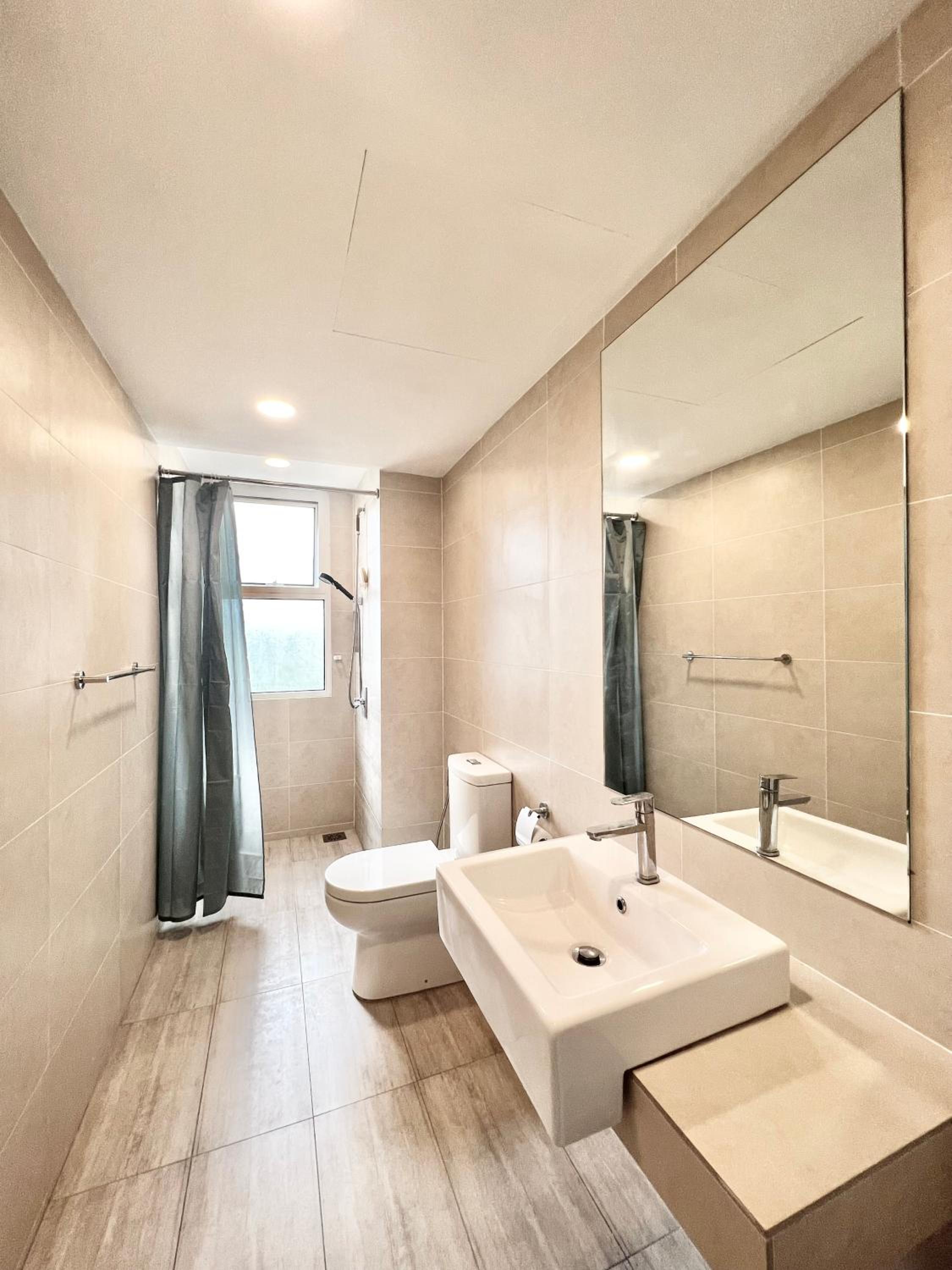 Three-Bedroom Apartment - Photo 2