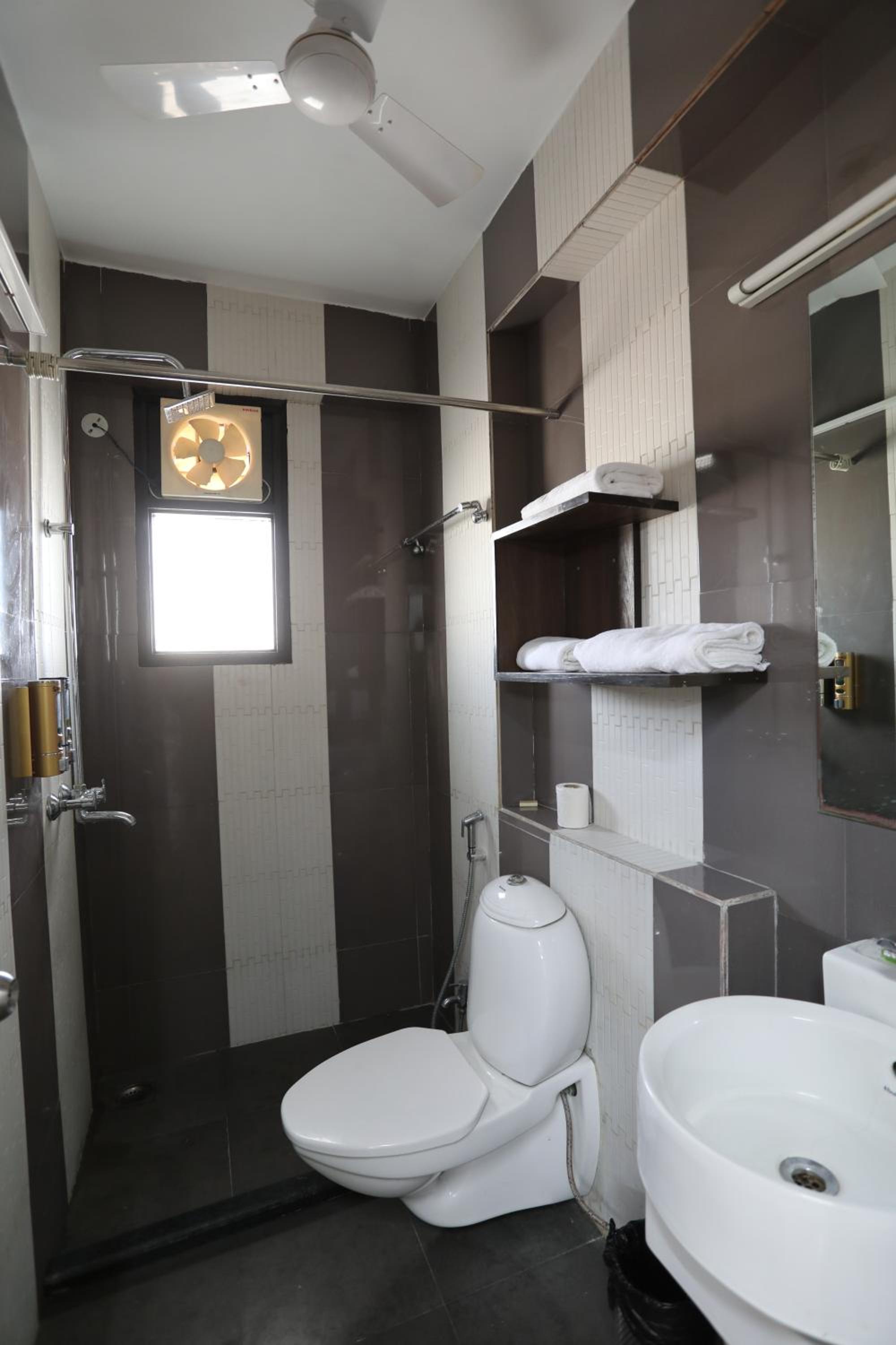 Three-Bedroom Apartment - Photo 24
