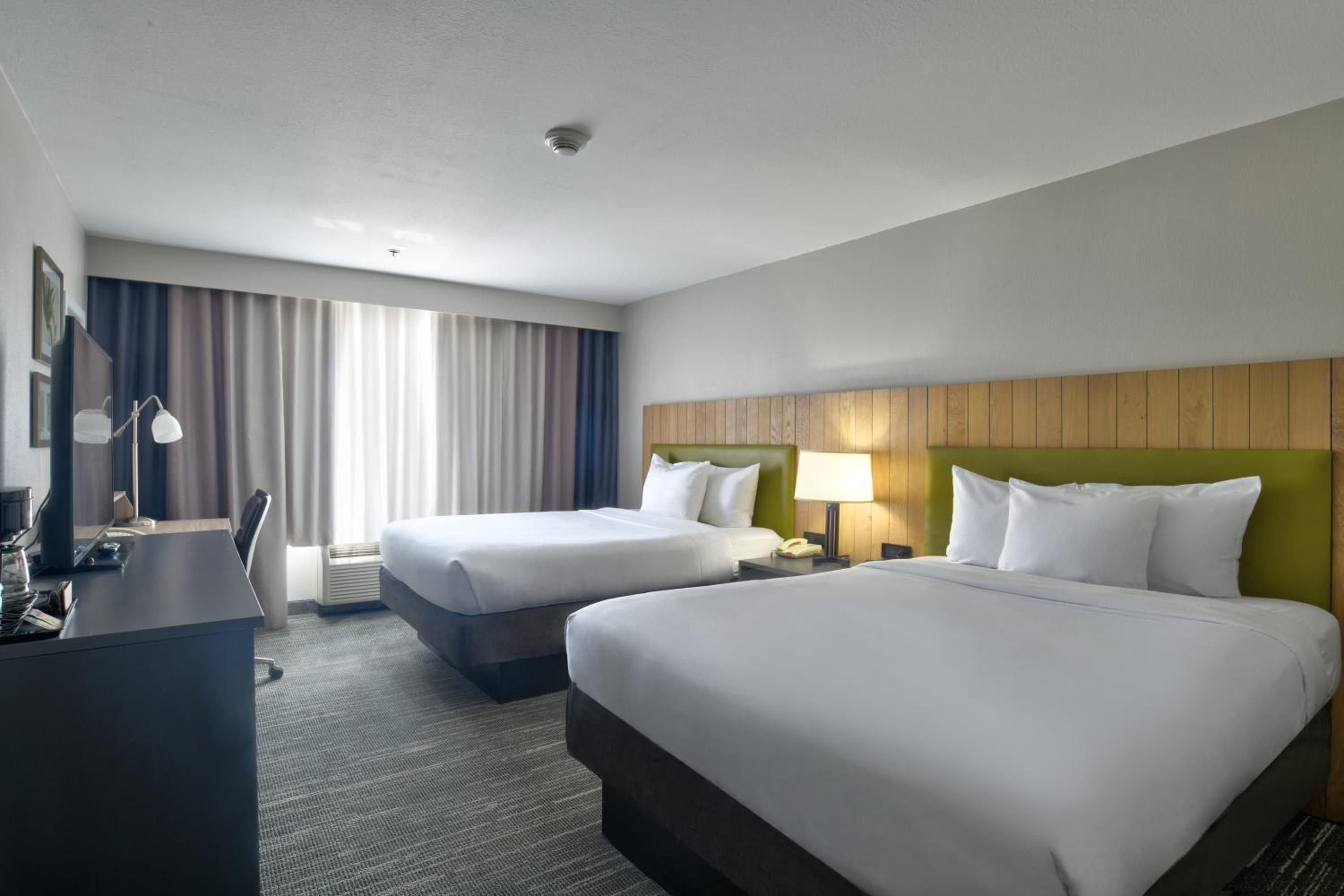 Queen Room with Two Queen Beds - Photo 1