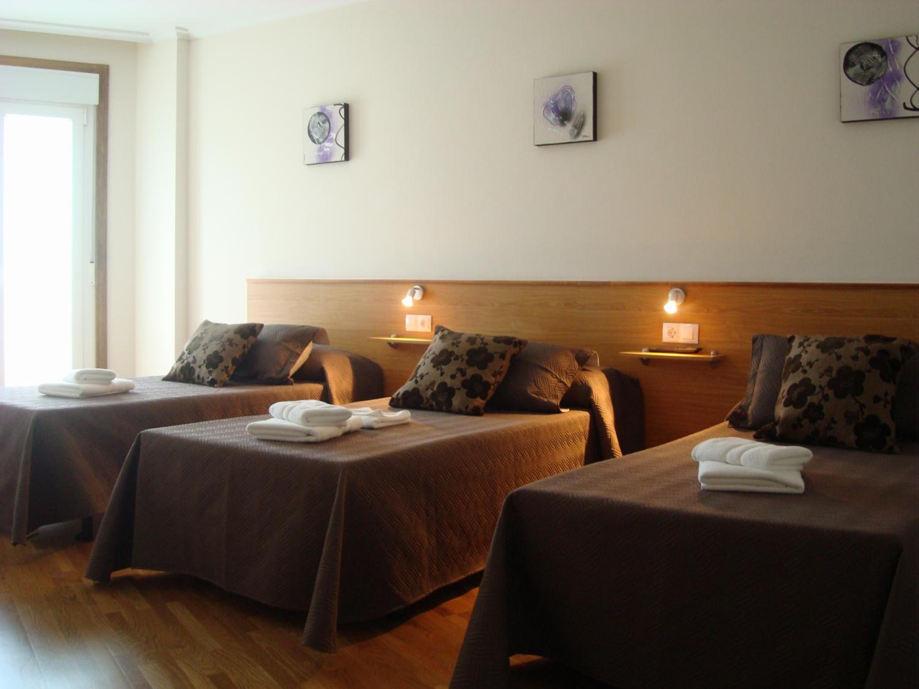 Habitación Triple con Balcón