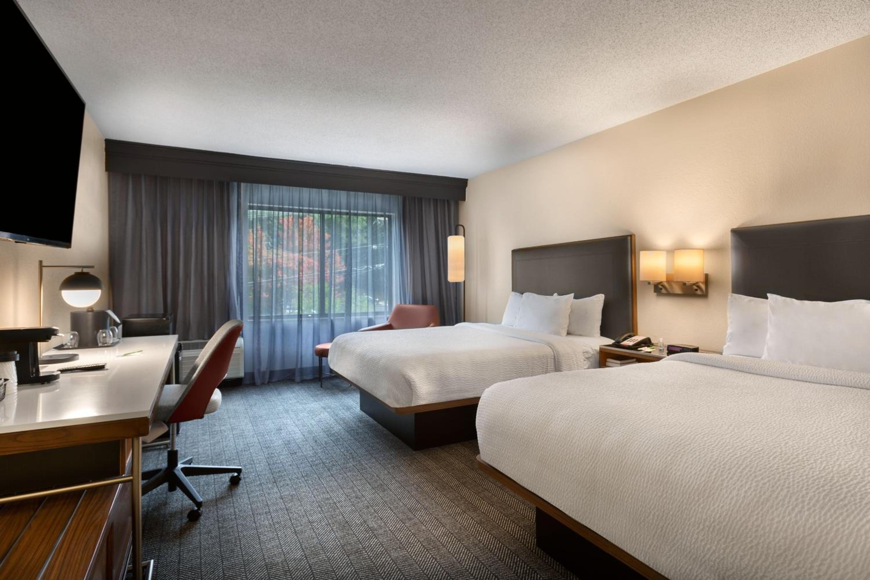 Queen Room with Two Queen Beds - Photo 1