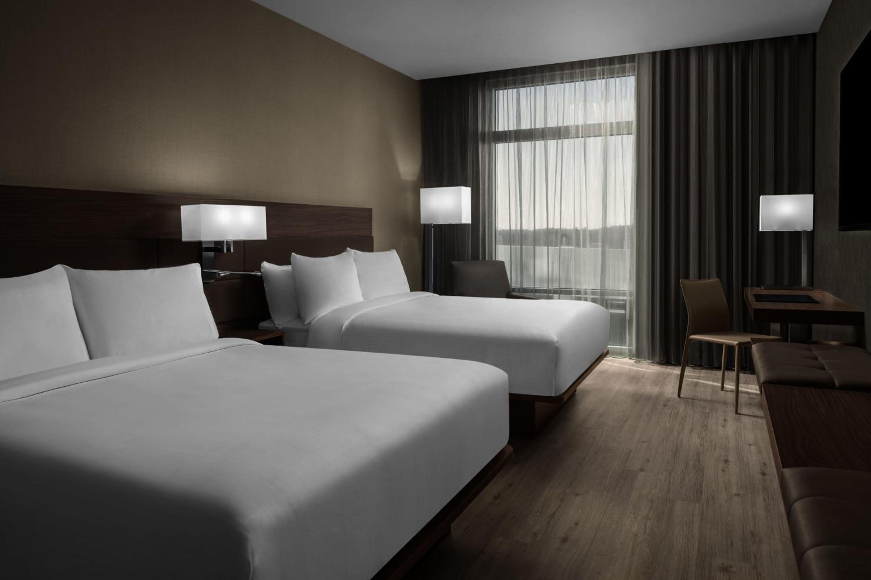 Queen Room with Two Queen Beds - Photo 1