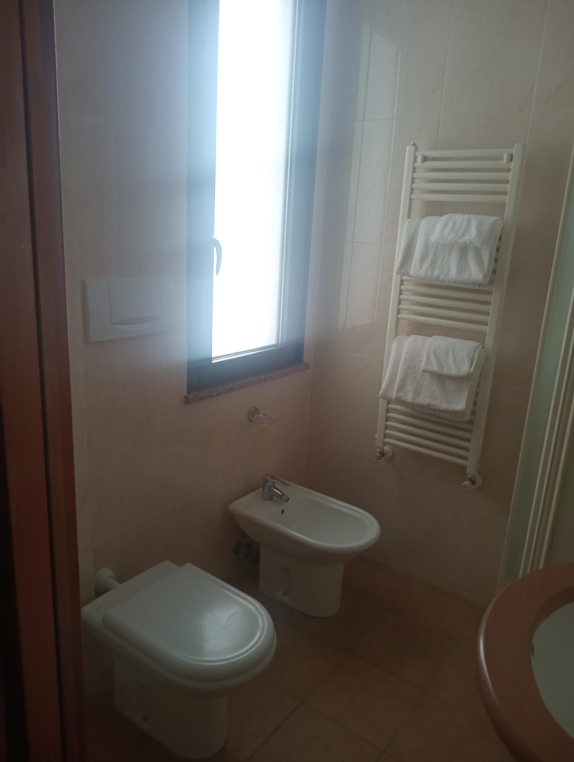 Quadruple Room with Private Bathroom photo 3