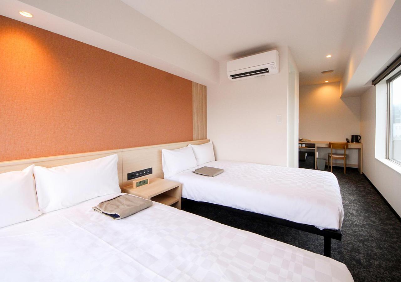 Standard Twin Room - Photo 9