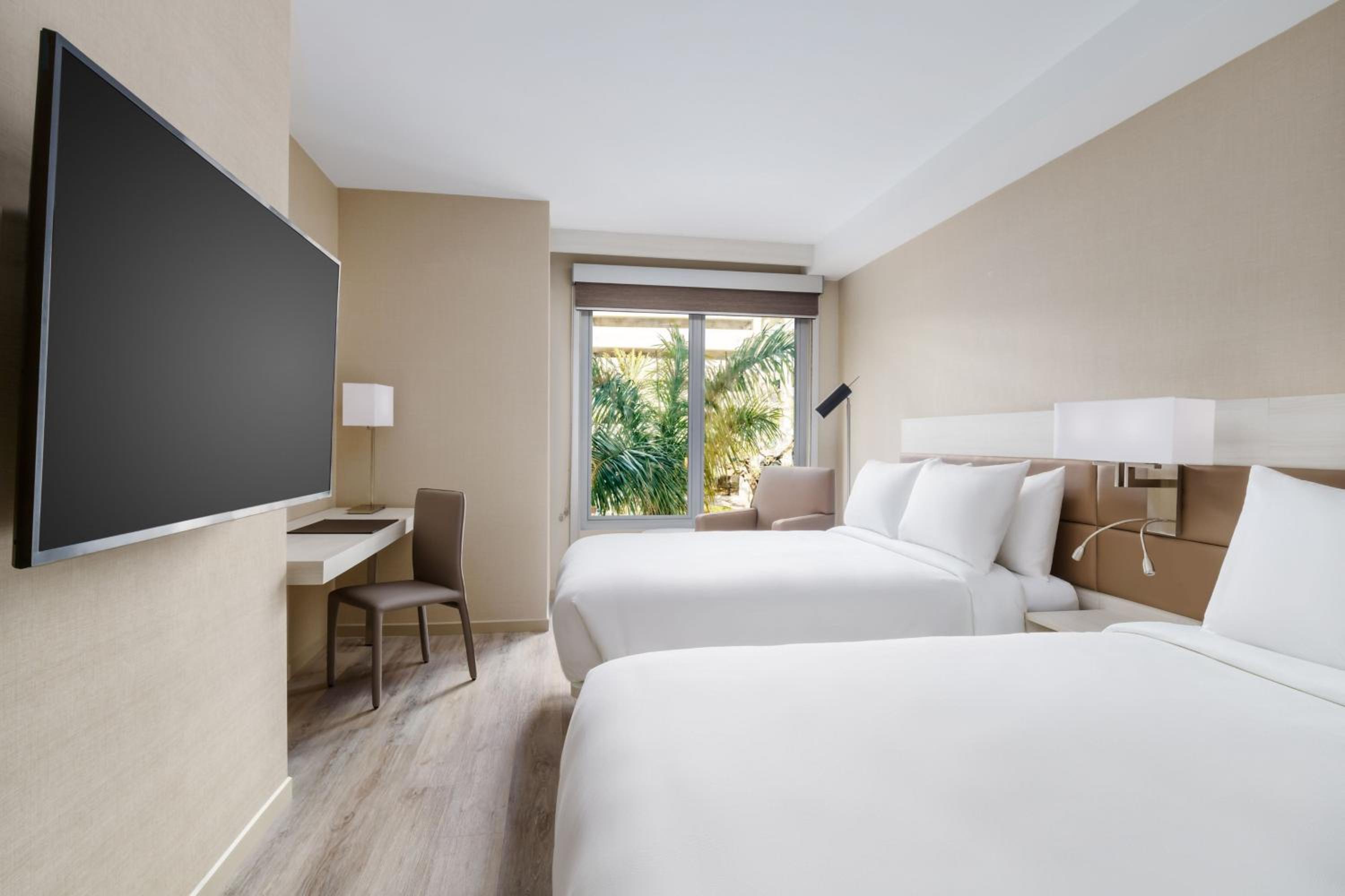 Queen Room with Two Queen Beds - Hearing Accessible - Photo 11