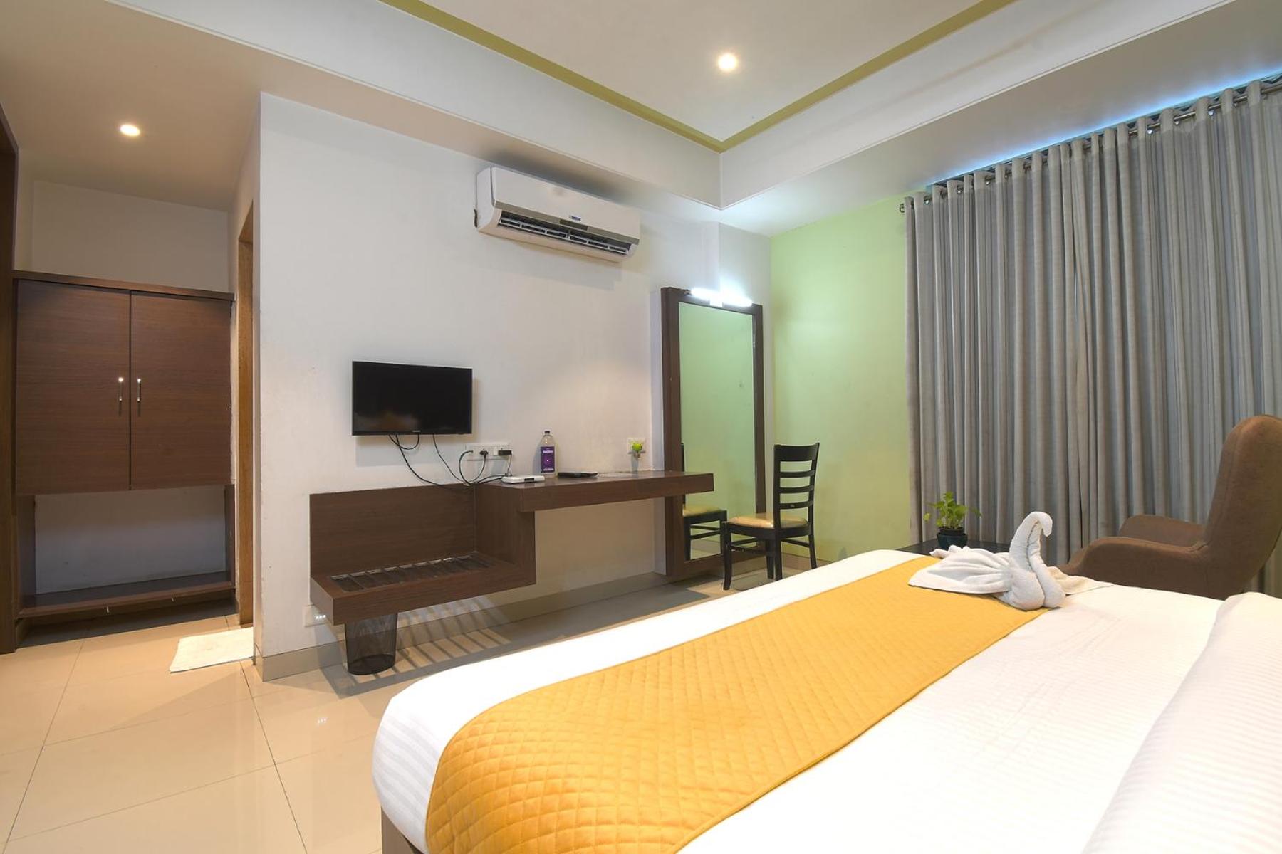 Deluxe Room - Photo 5
