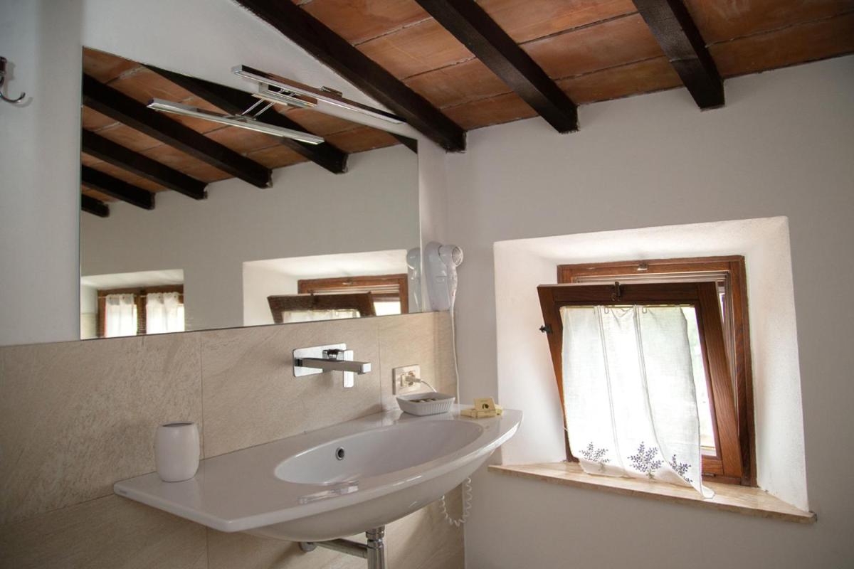 Deluxe Quadruple Room - Photo 6