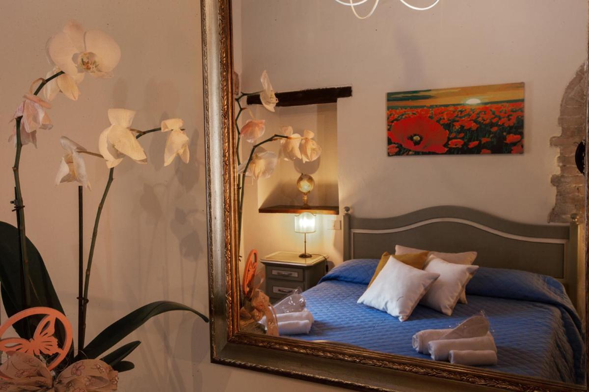 Deluxe Quadruple Room - Photo 8