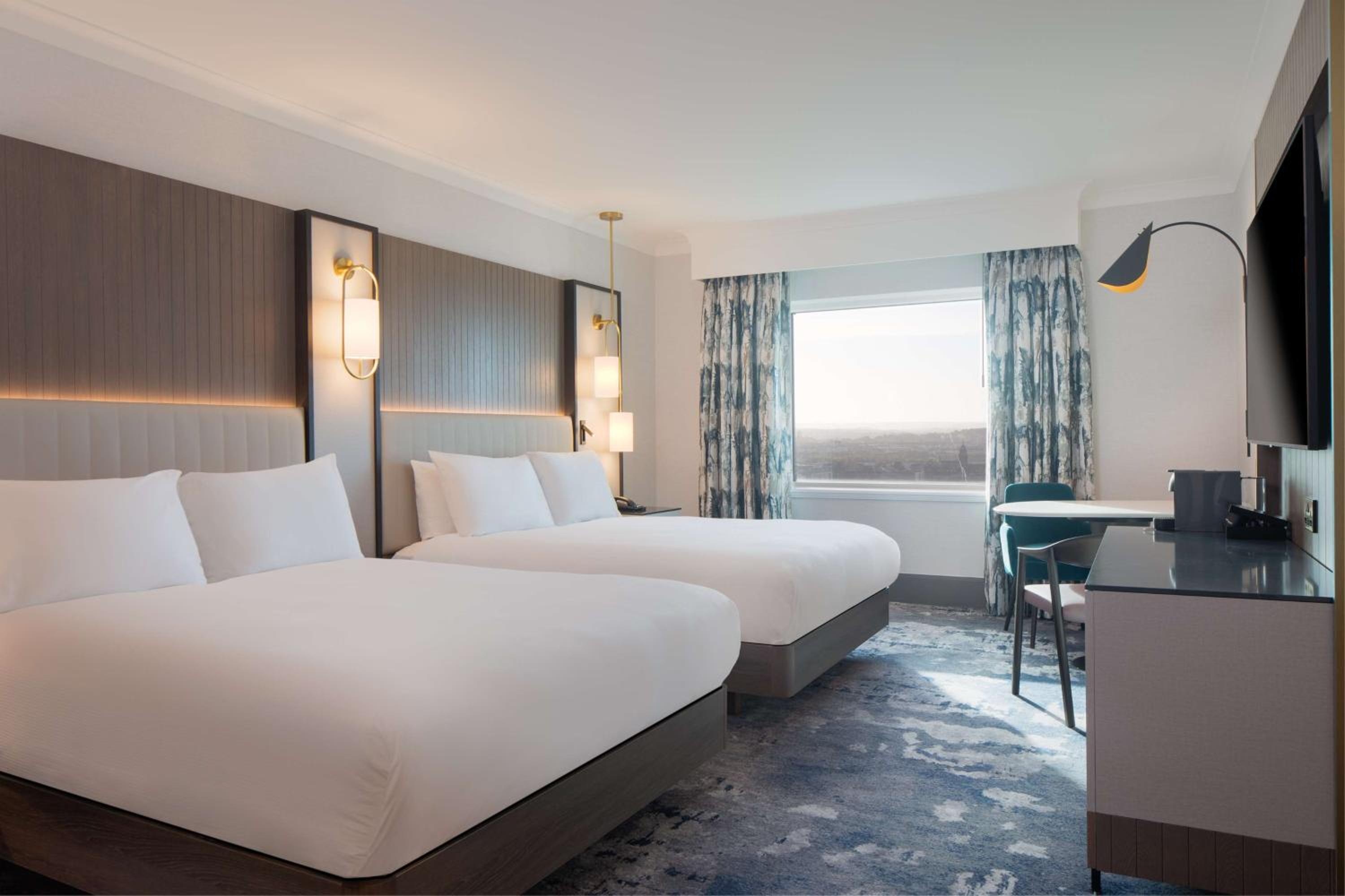 Deluxe Queen Room with Two Queen Beds - Photo 1