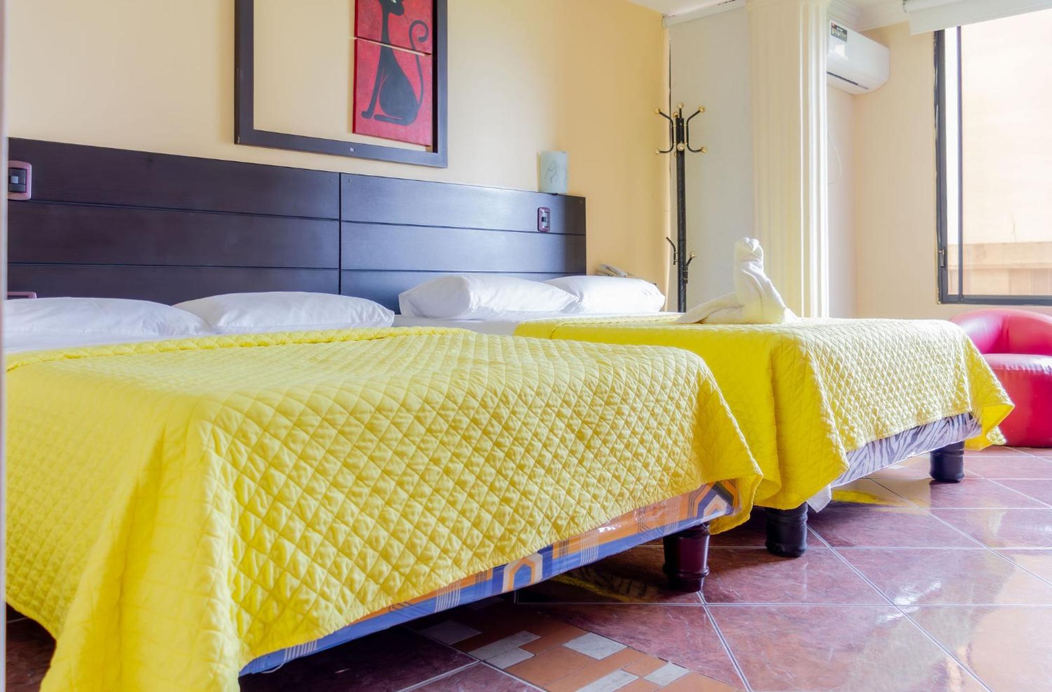 Deluxe Queen Room with Two Queen Beds photo 1