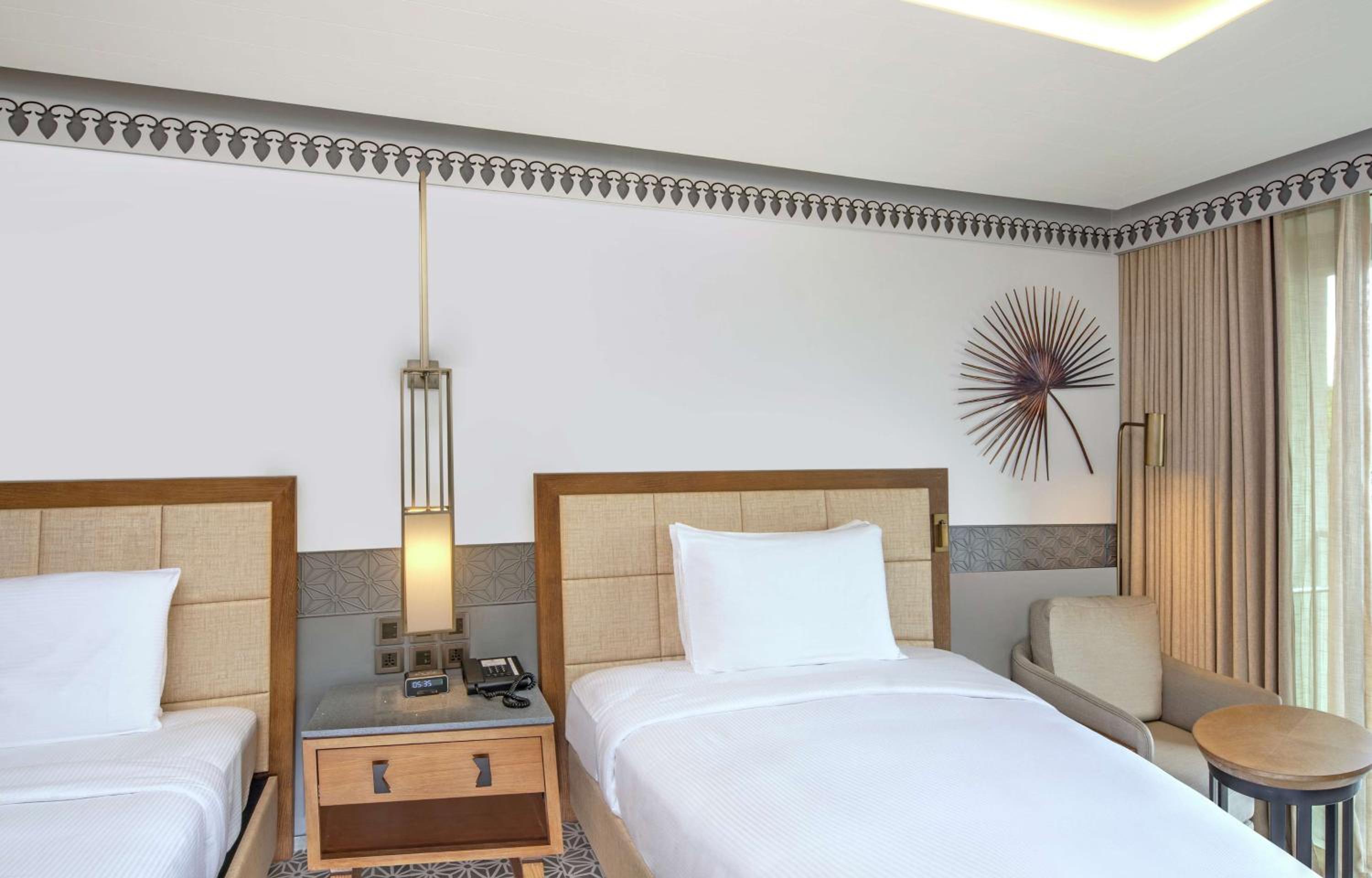 Deluxe Twin Room with Balcony and River View Deluxe Twin Room with Balcony and River View