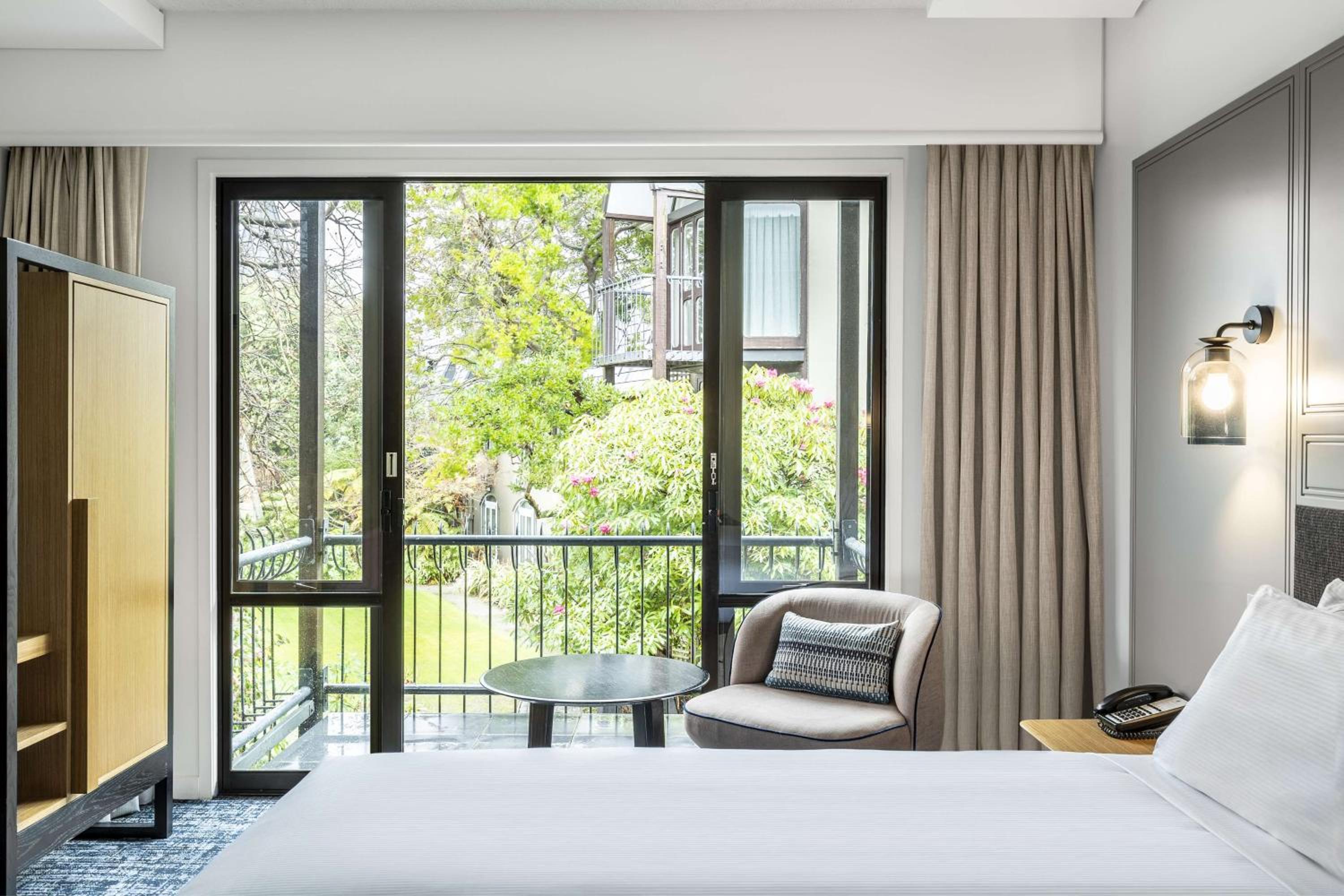 Deluxe King Room with Balcony - Photo 1