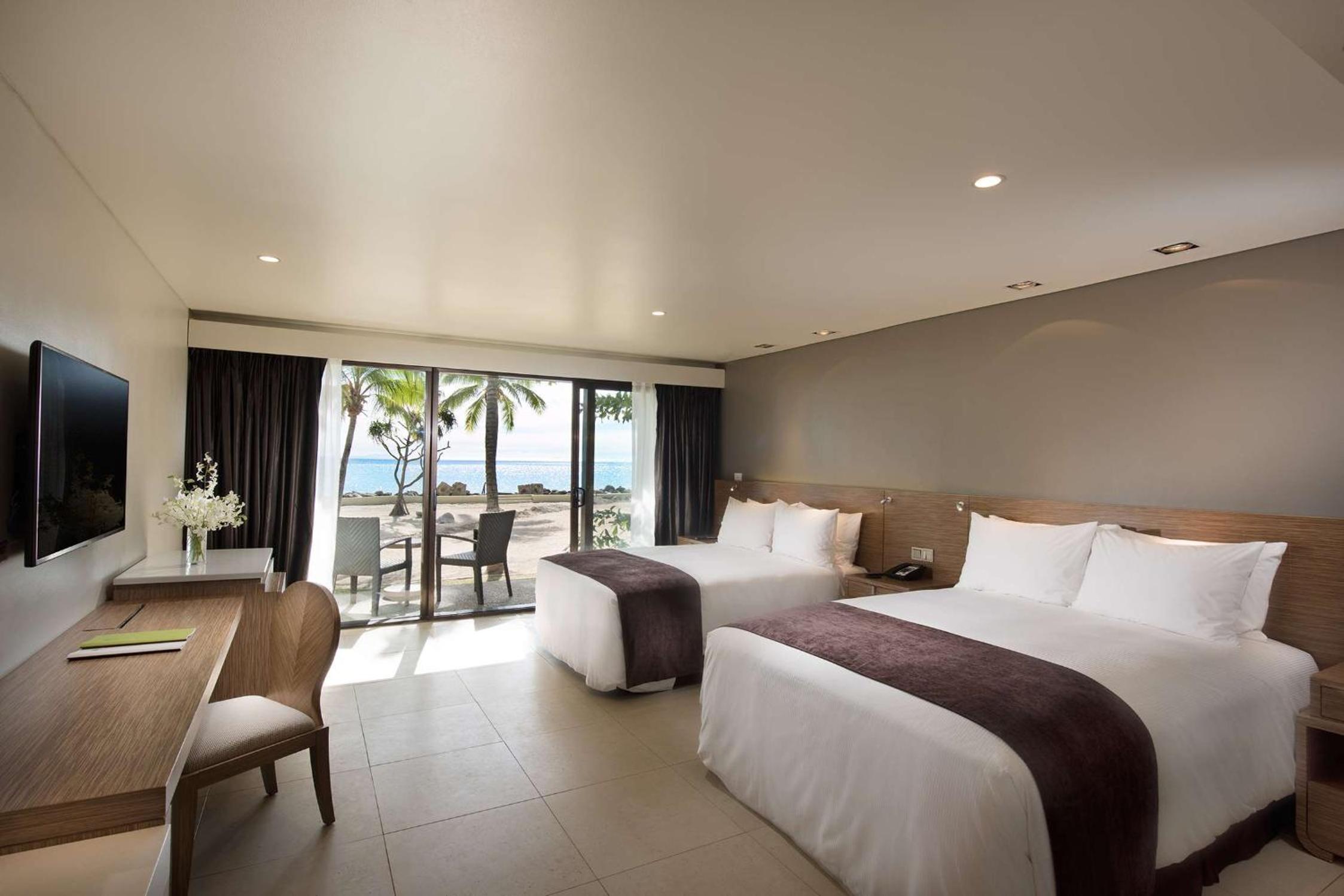 Double Queen Guest Room Beachfront with Balcony