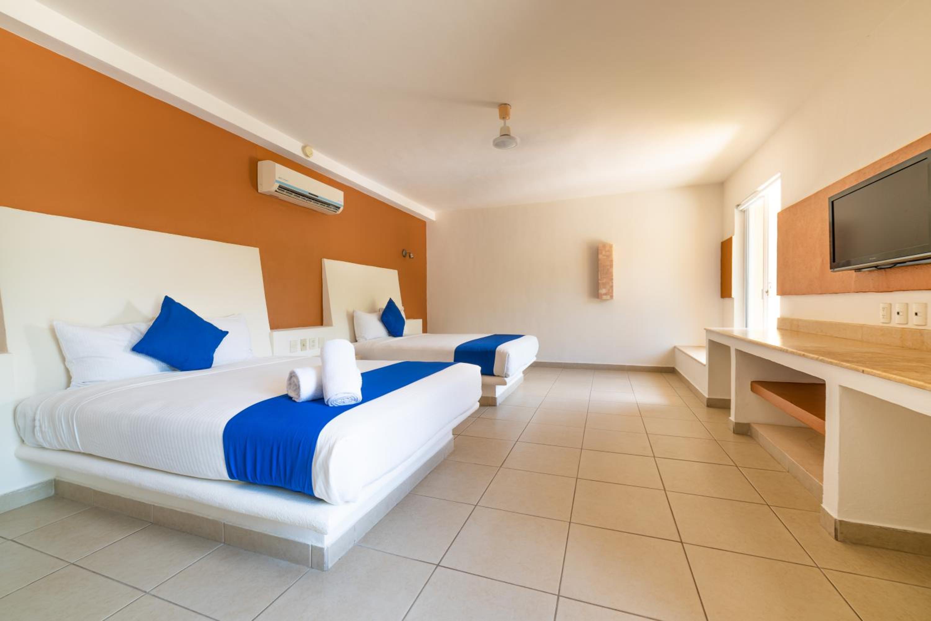 Queen Room with Two Queen Beds - Photo 1