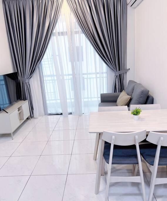Three-Bedroom Apartment photo 1