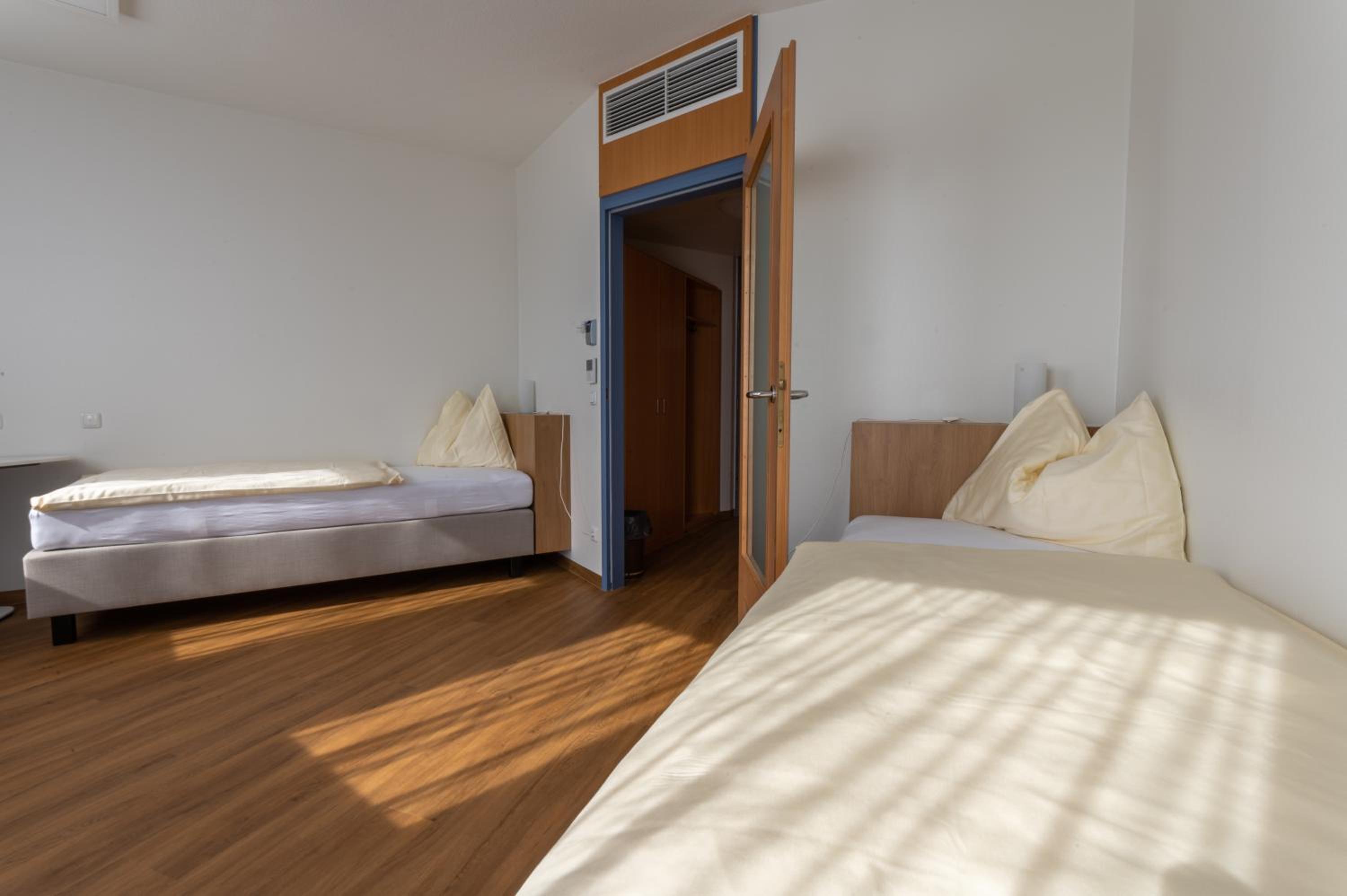 Twin Room - Photo 1