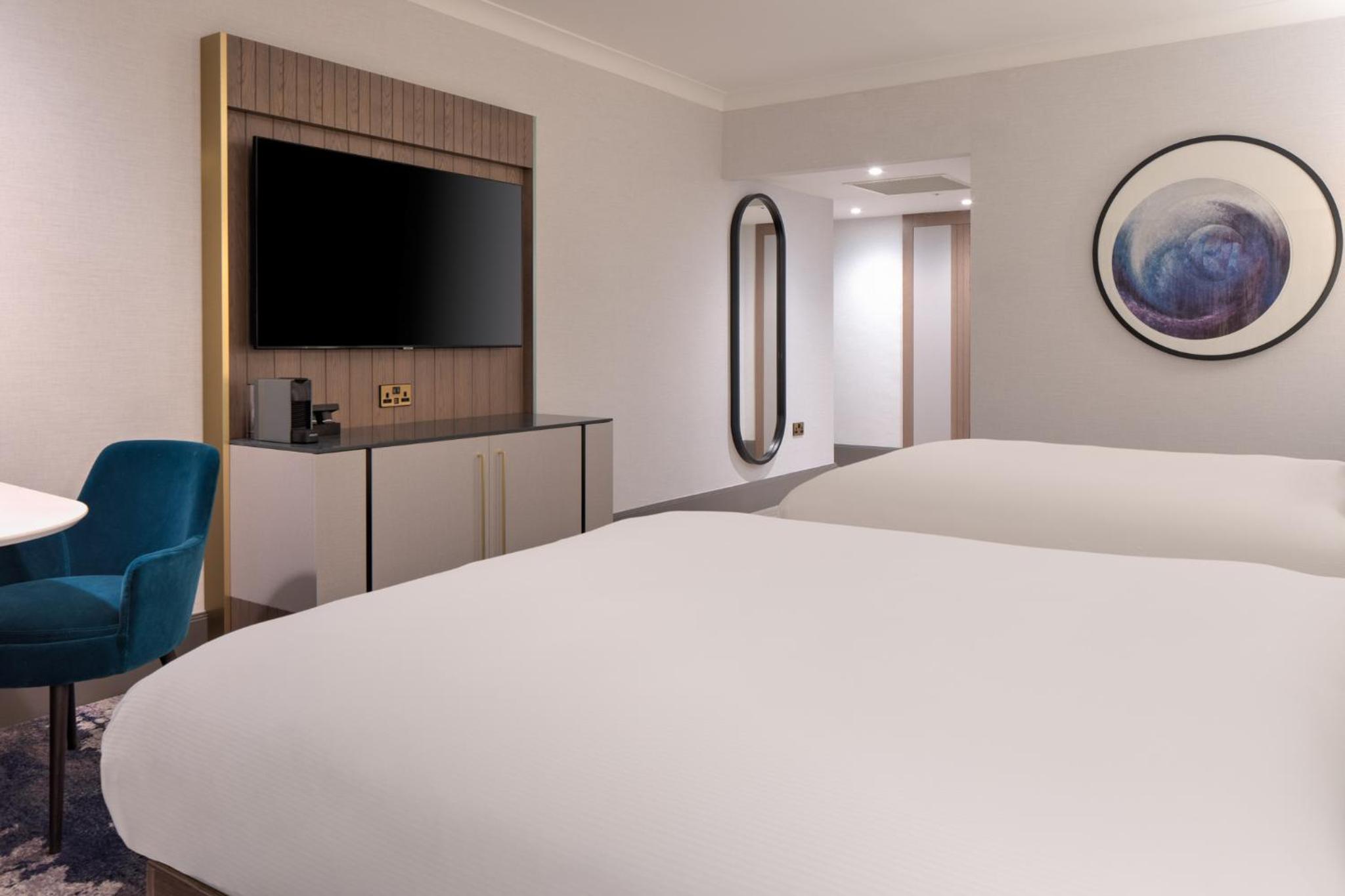 Deluxe Queen Room with Two Queen Beds - Photo 2