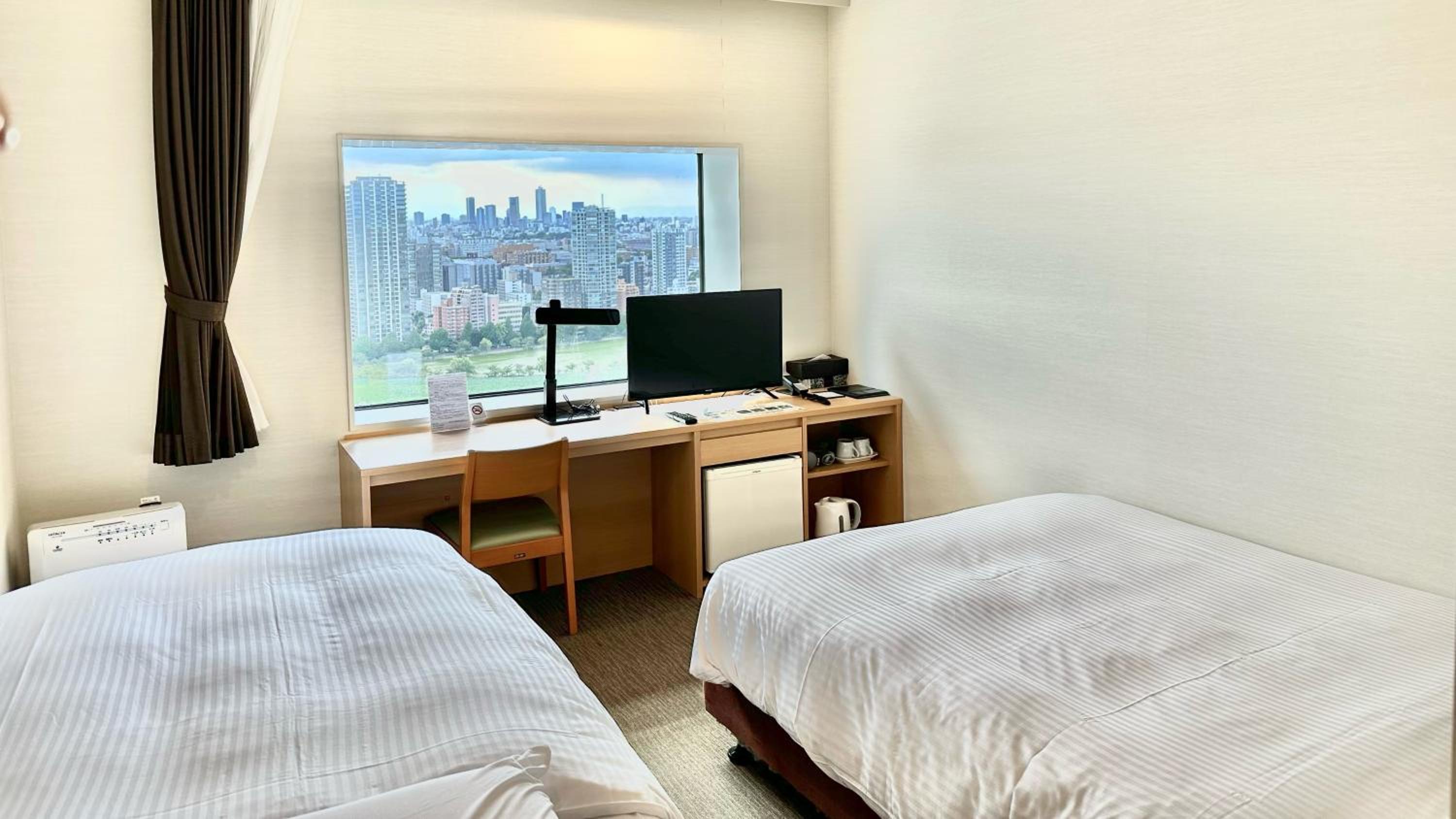 Economy Twin Room - Non-Smoking photo 2