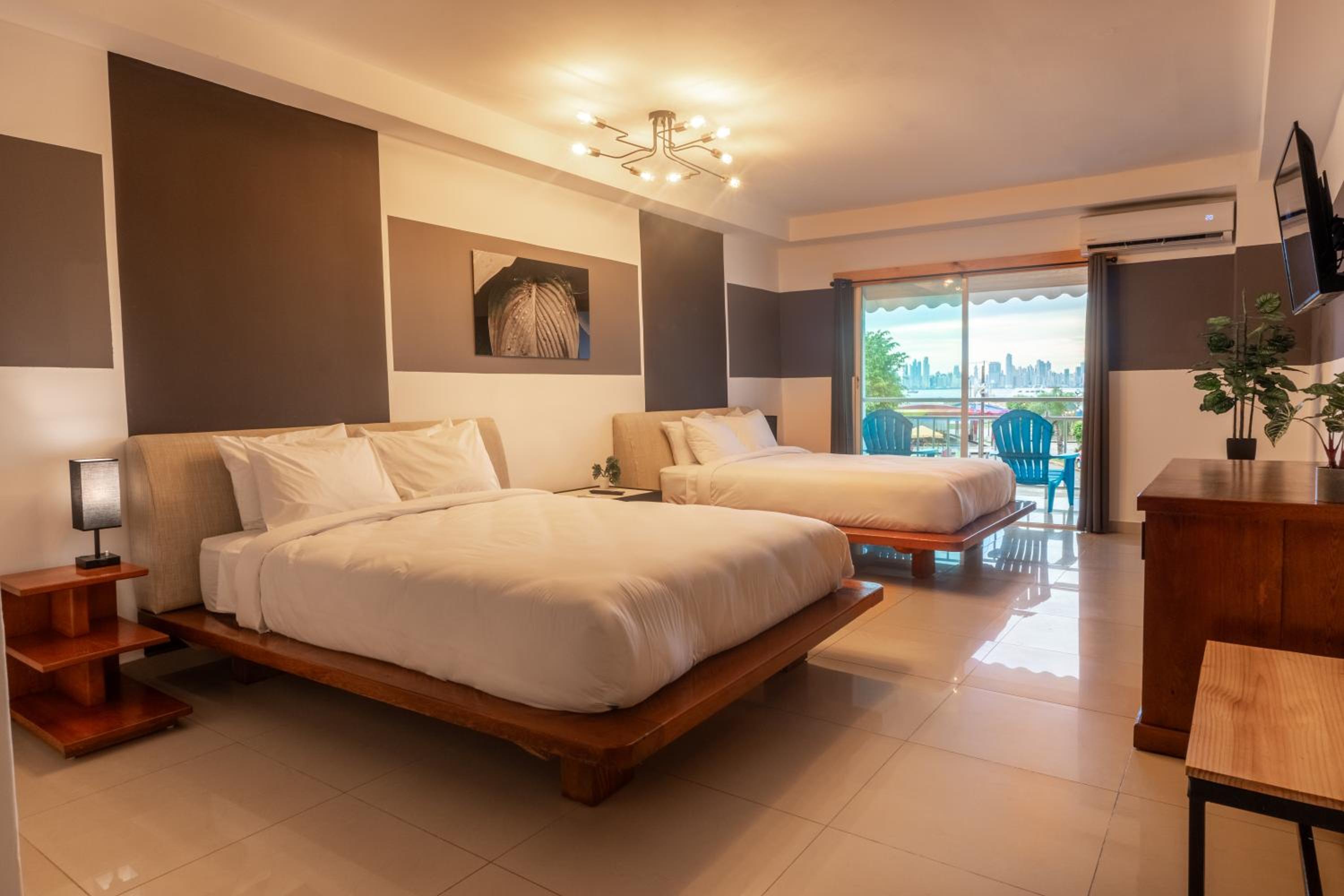 Deluxe Double Room with Balcony and City View